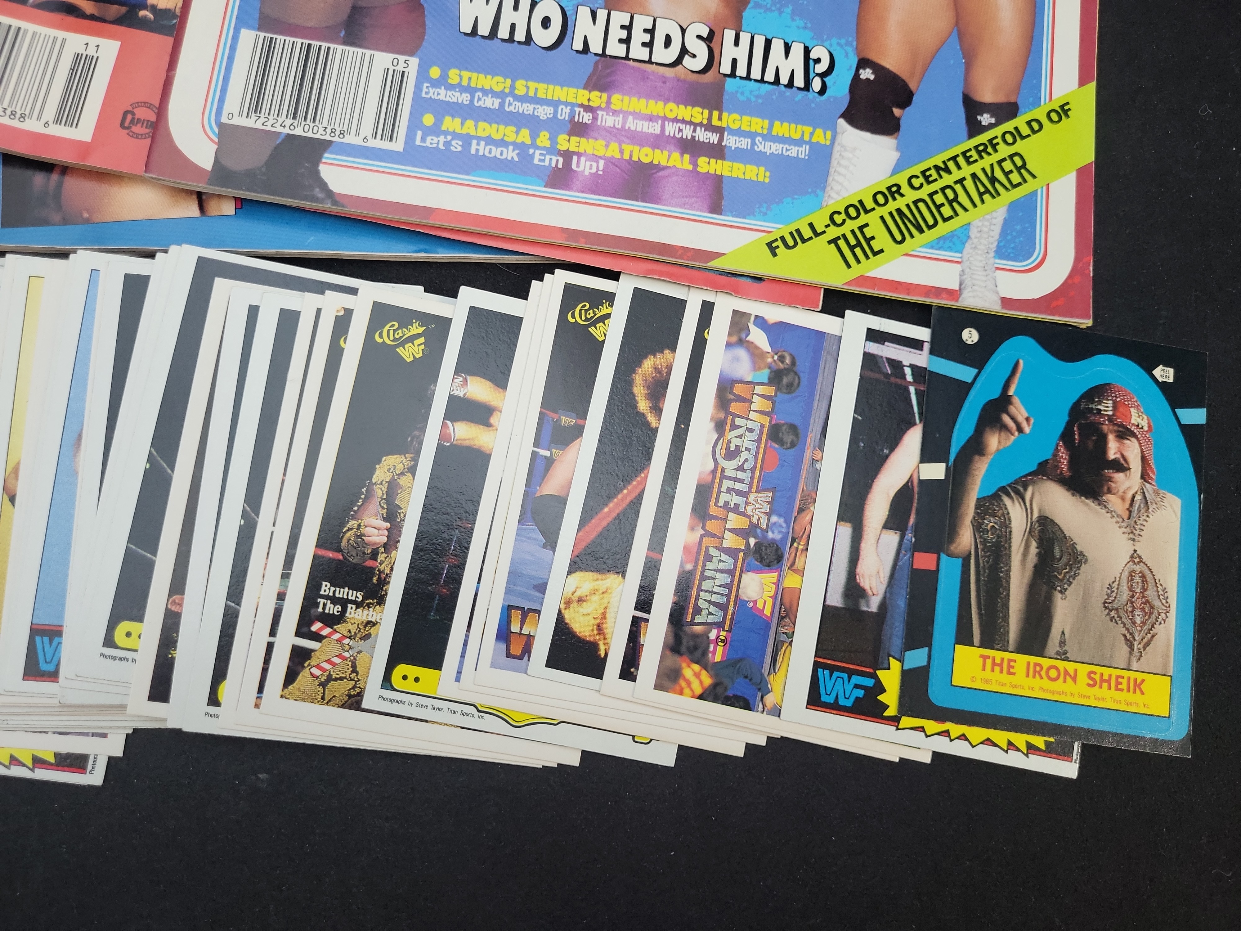I03658 | Five Vintage Pro Wrestling Illustrated Magazines and a Collection of WWF Trading Cards and Stickers