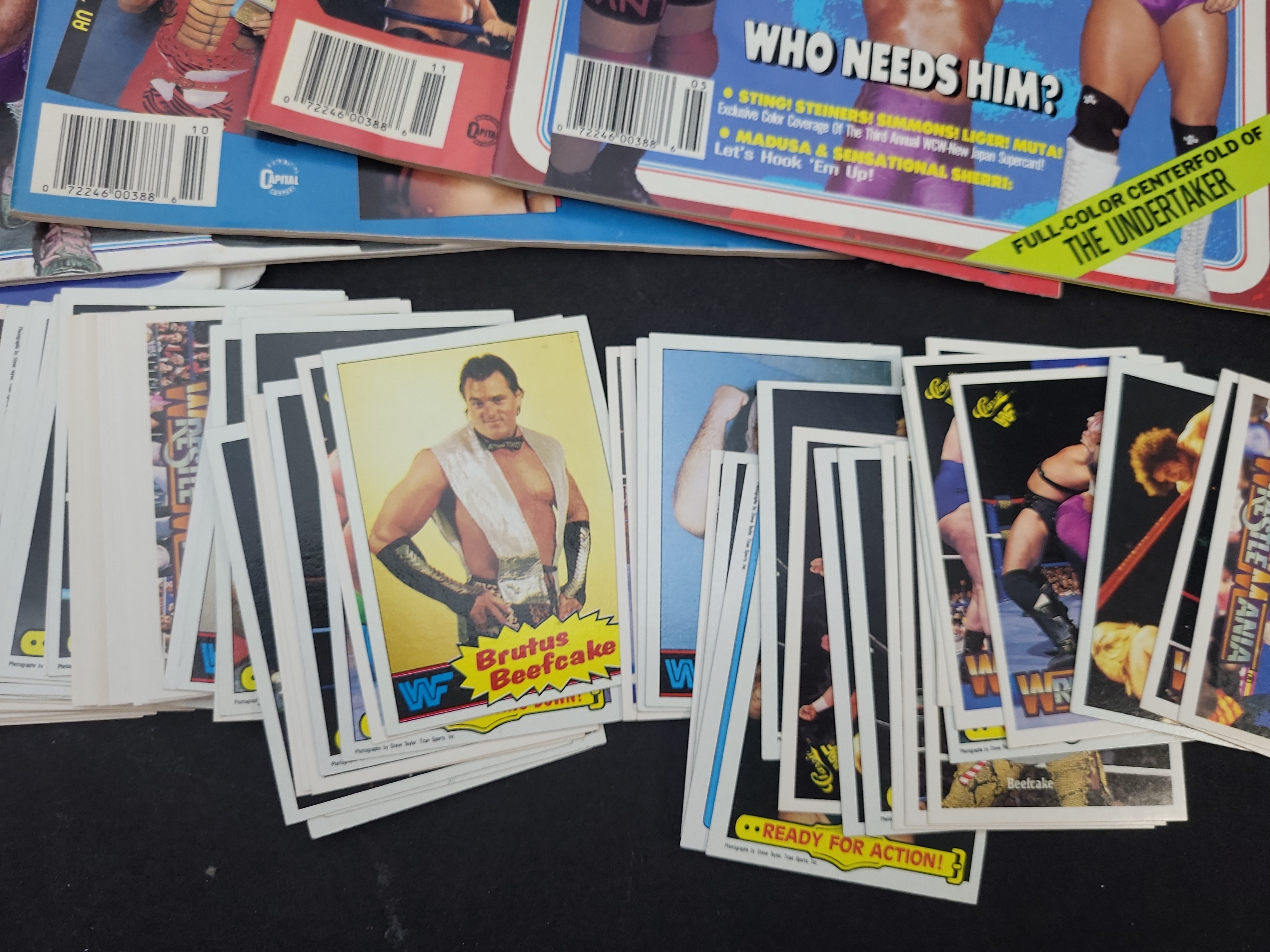 I03658 | Five Vintage Pro Wrestling Illustrated Magazines and a Collection of WWF Trading Cards and Stickers