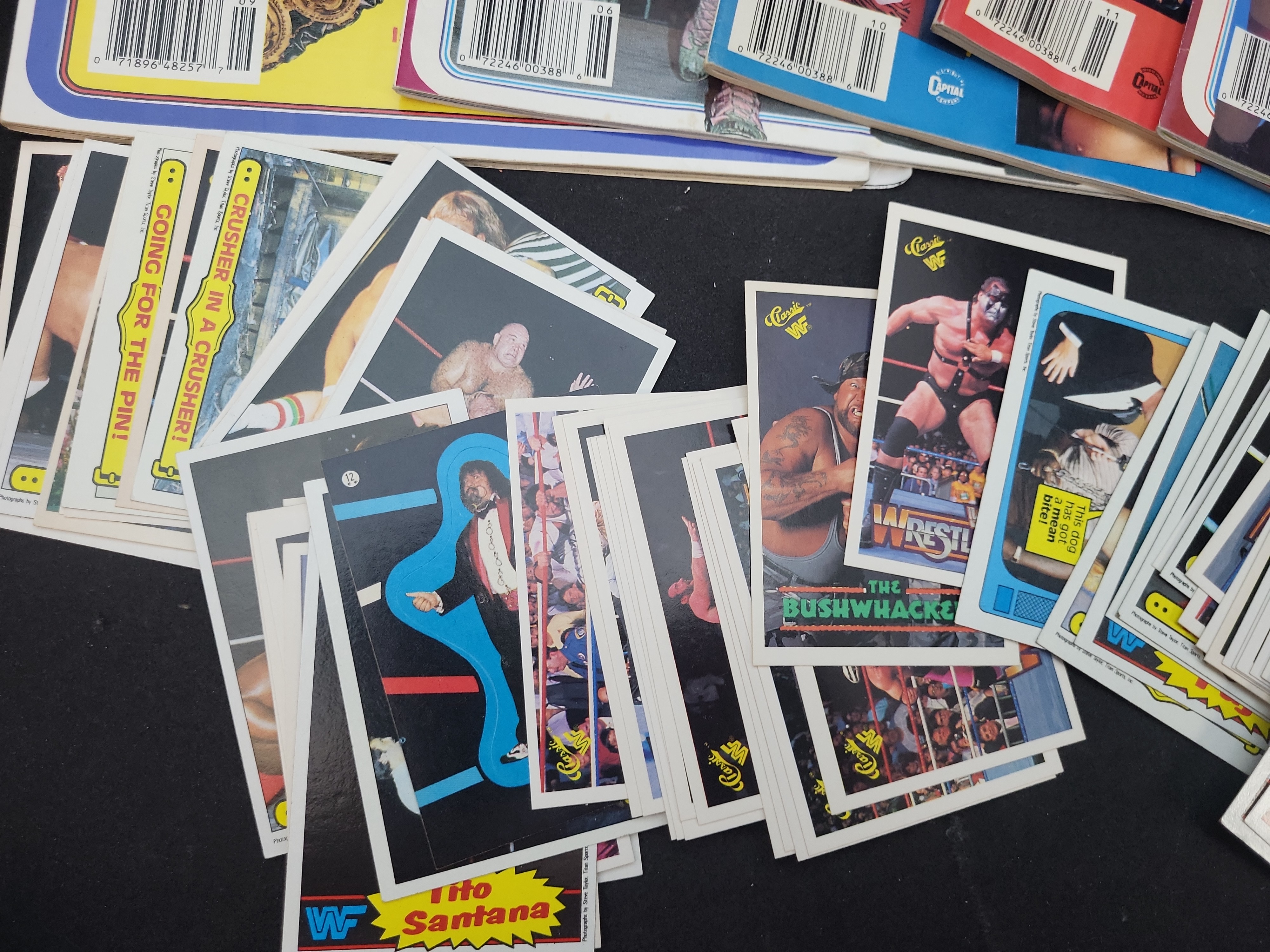 I03658 | Five Vintage Pro Wrestling Illustrated Magazines and a Collection of WWF Trading Cards and Stickers