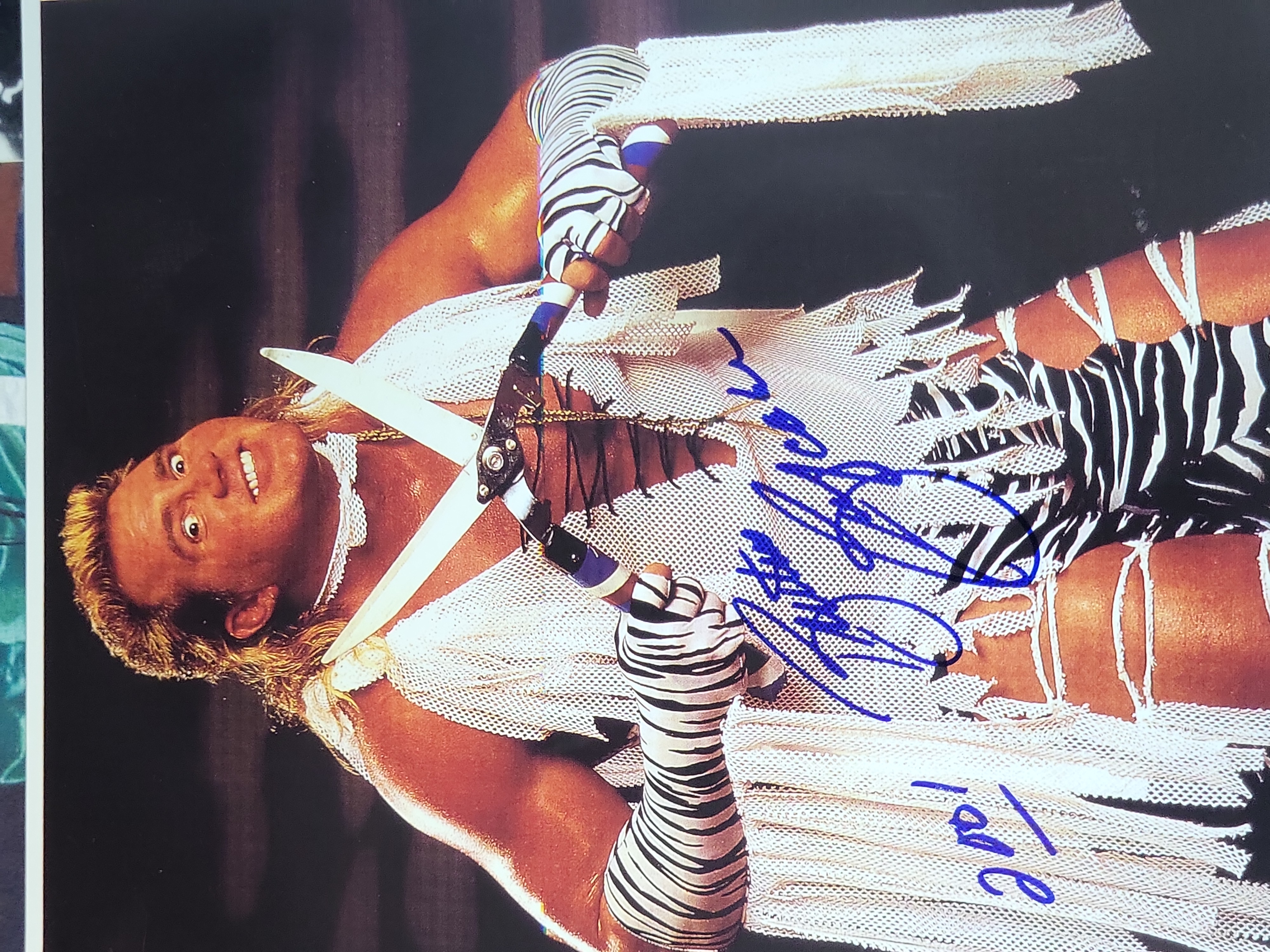 I03017 | A Collection of Eight Autographed Boxing and Professional Wrestling Photographs with Certificates of Authenticity