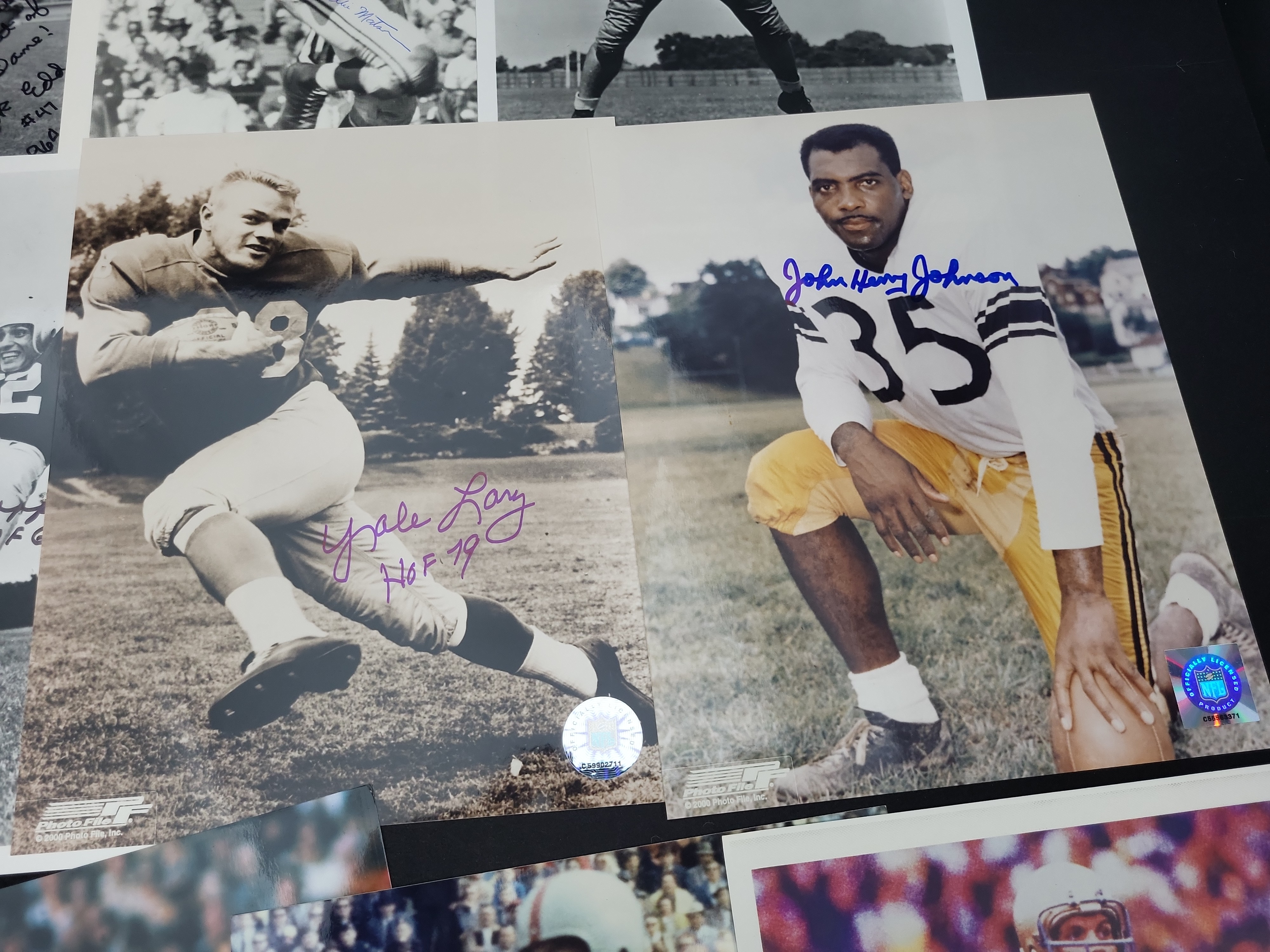 I03005 | A Collection of Approximately 15 Autographed Football Photographs and Memorabilia Featuring Heisman Trophy Winners and Hall of Fame