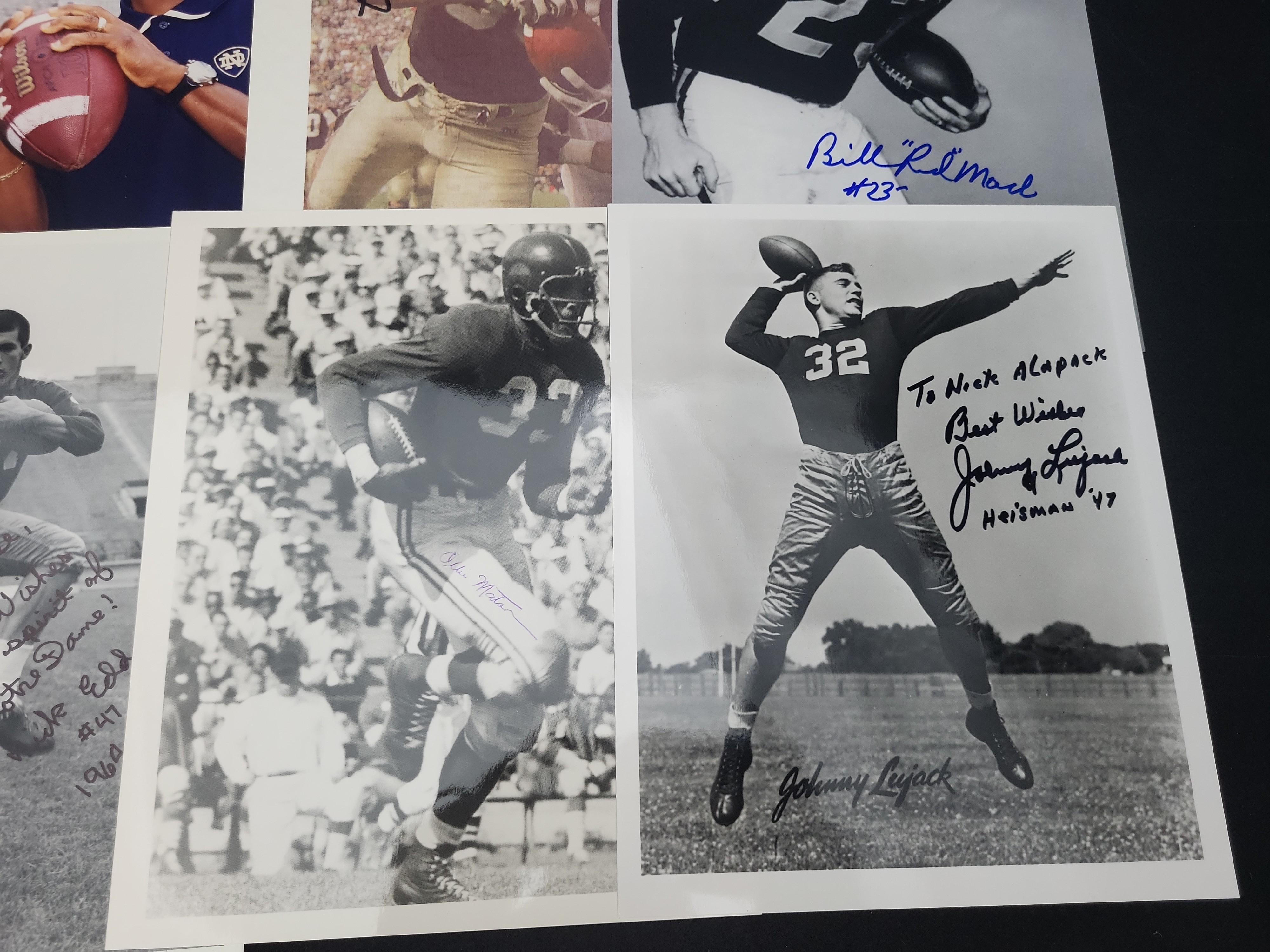 I03005 | A Collection of Approximately 15 Autographed Football Photographs and Memorabilia Featuring Heisman Trophy Winners and Hall of Fame