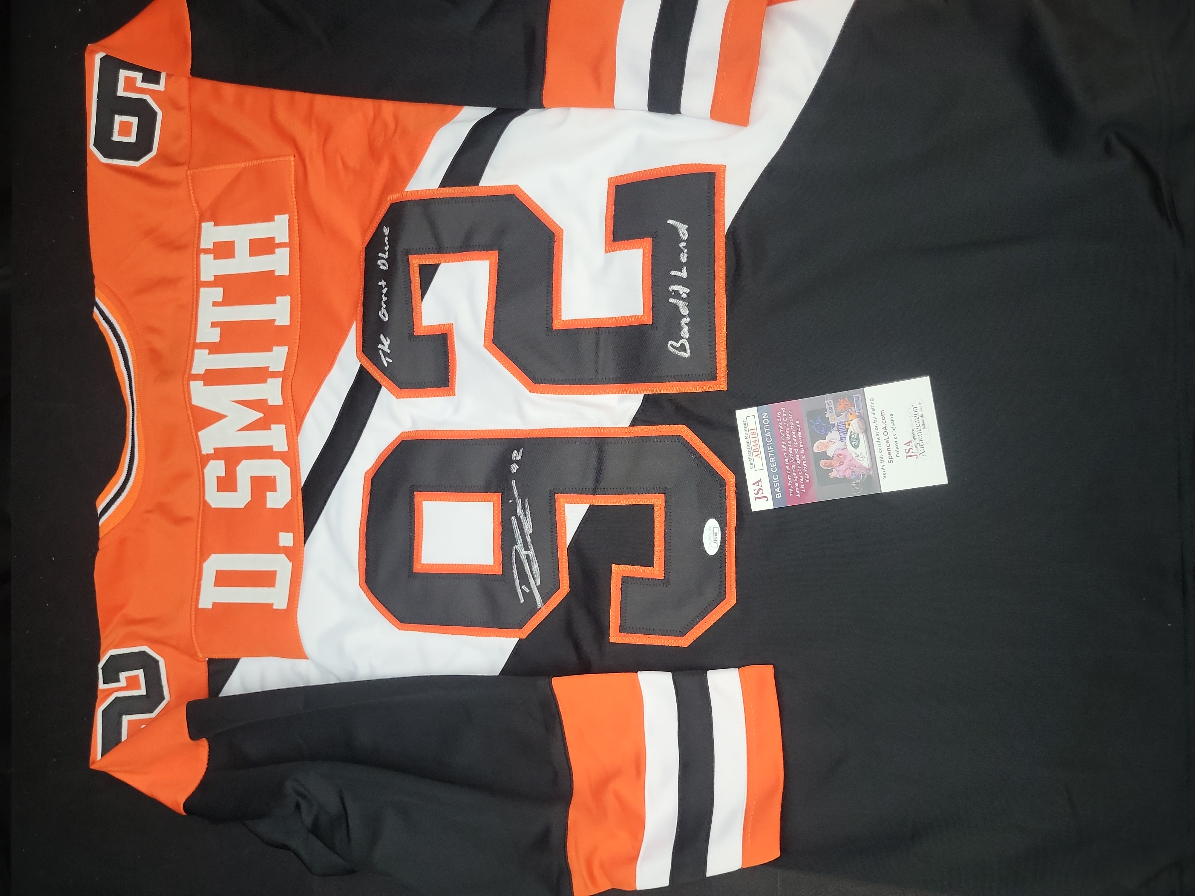 I03559 | Dhane Smith Signed Buffalo Bandits NLL Lacrosse Jersey with Inscriptions and JSA Authentication