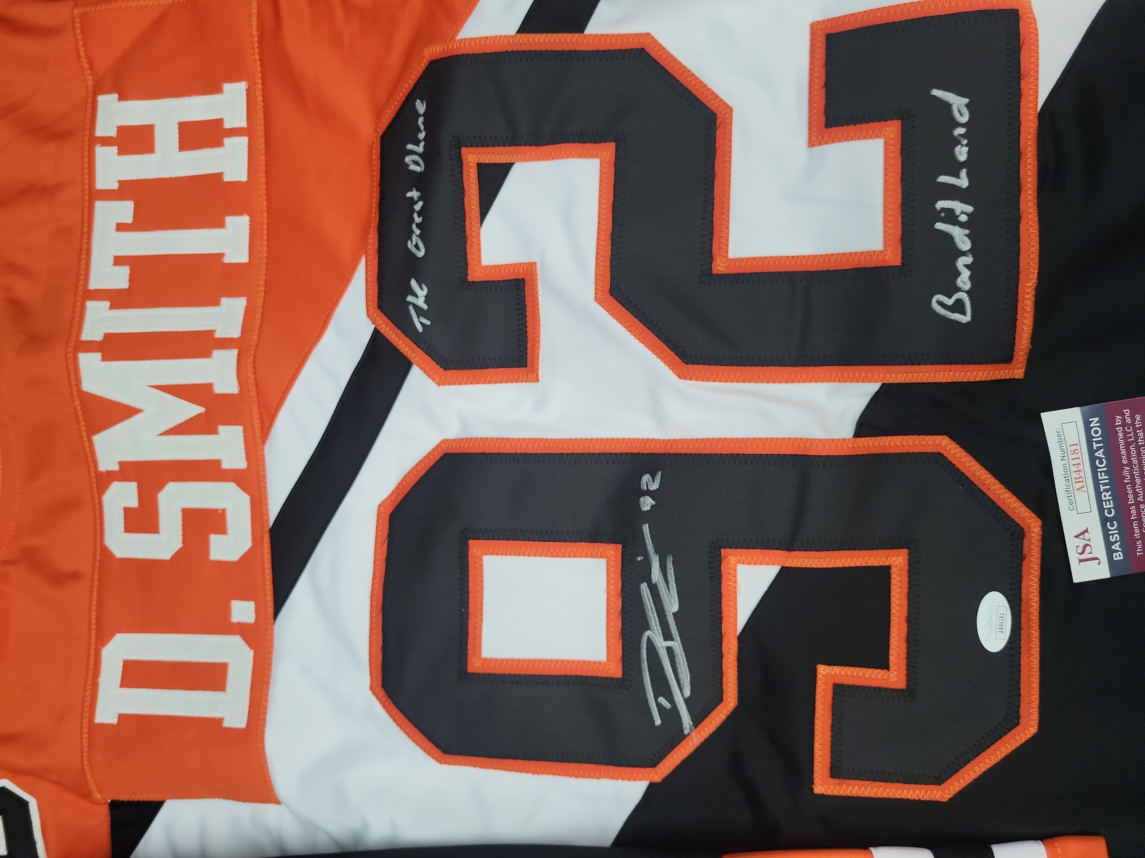 I03559 | Dhane Smith Signed Buffalo Bandits NLL Lacrosse Jersey with Inscriptions and JSA Authentication