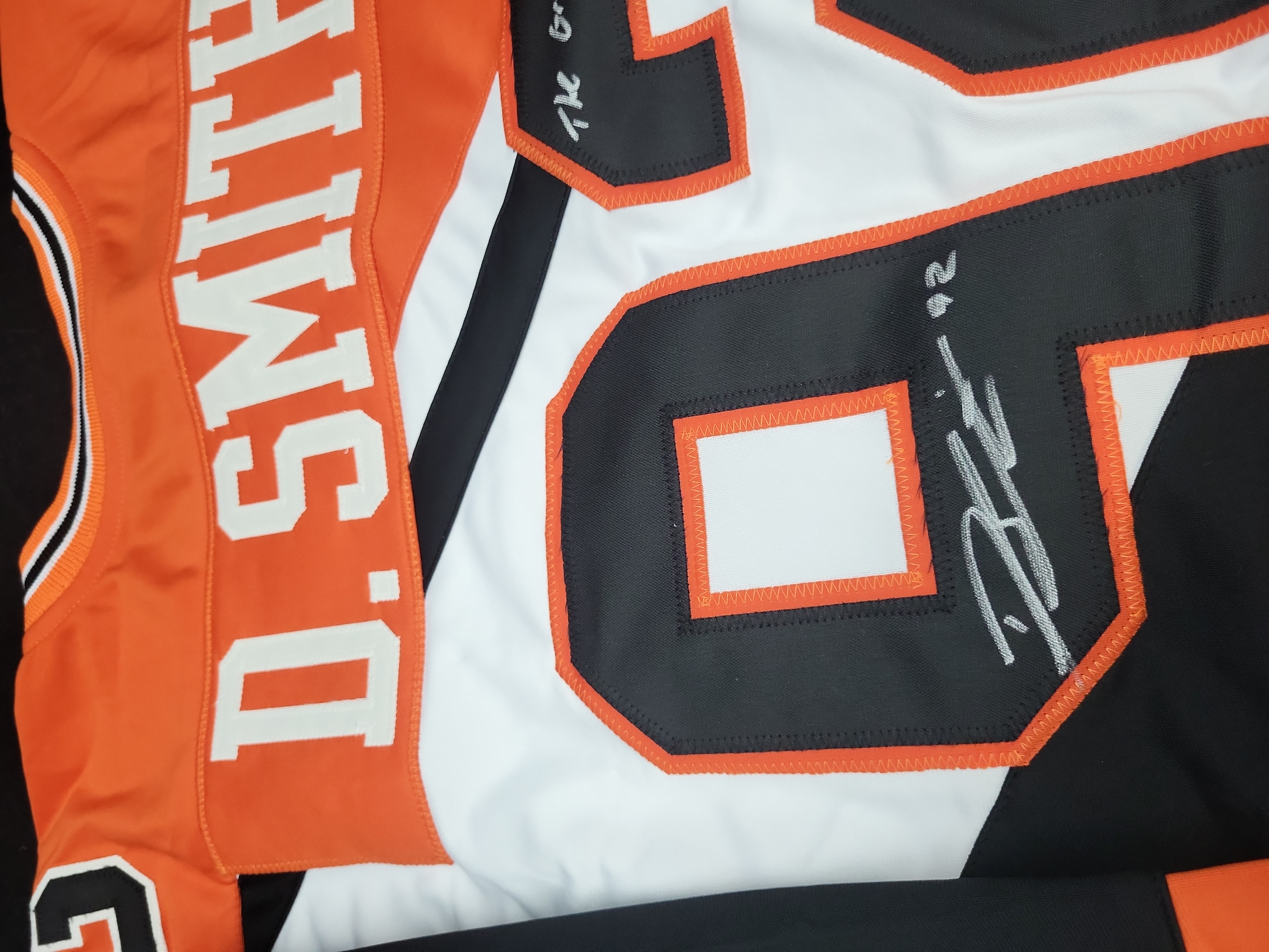 I03559 | Dhane Smith Signed Buffalo Bandits NLL Lacrosse Jersey with Inscriptions and JSA Authentication