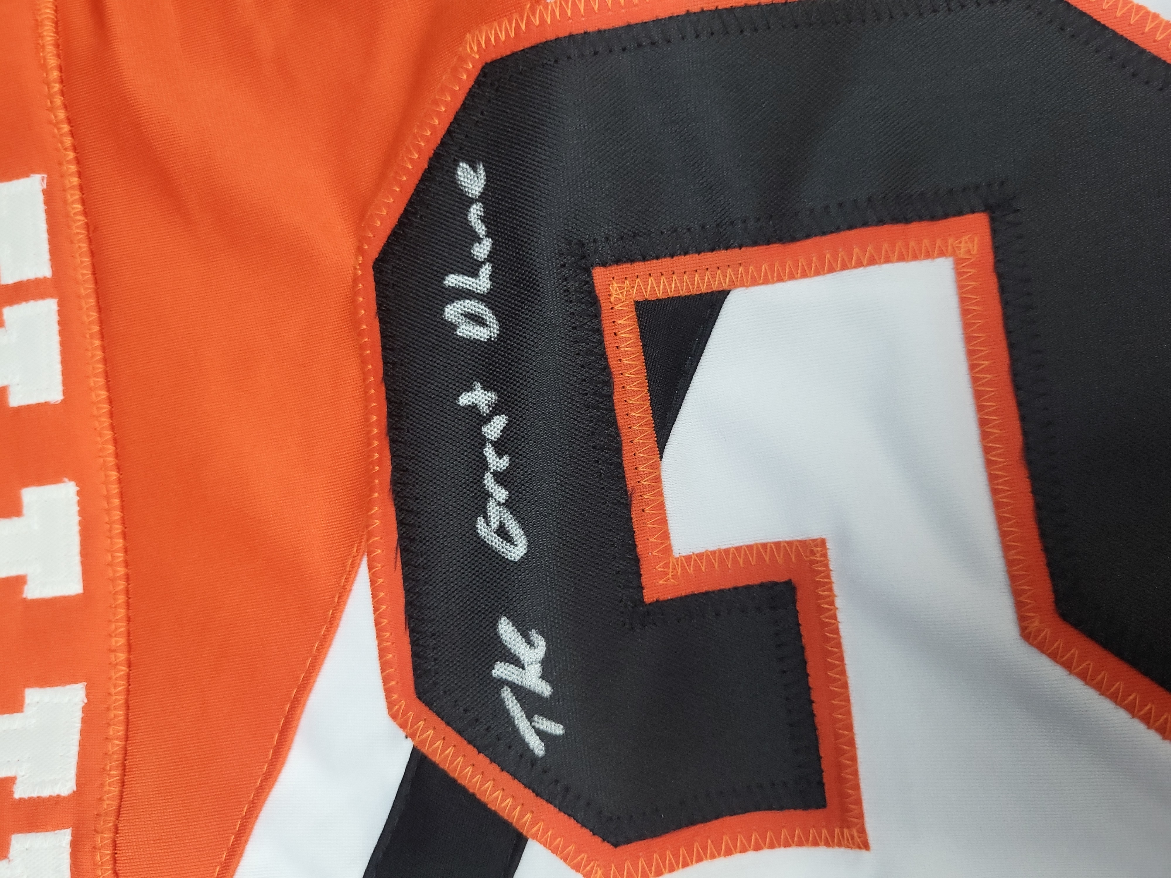 I03559 | Dhane Smith Signed Buffalo Bandits NLL Lacrosse Jersey with Inscriptions and JSA Authentication