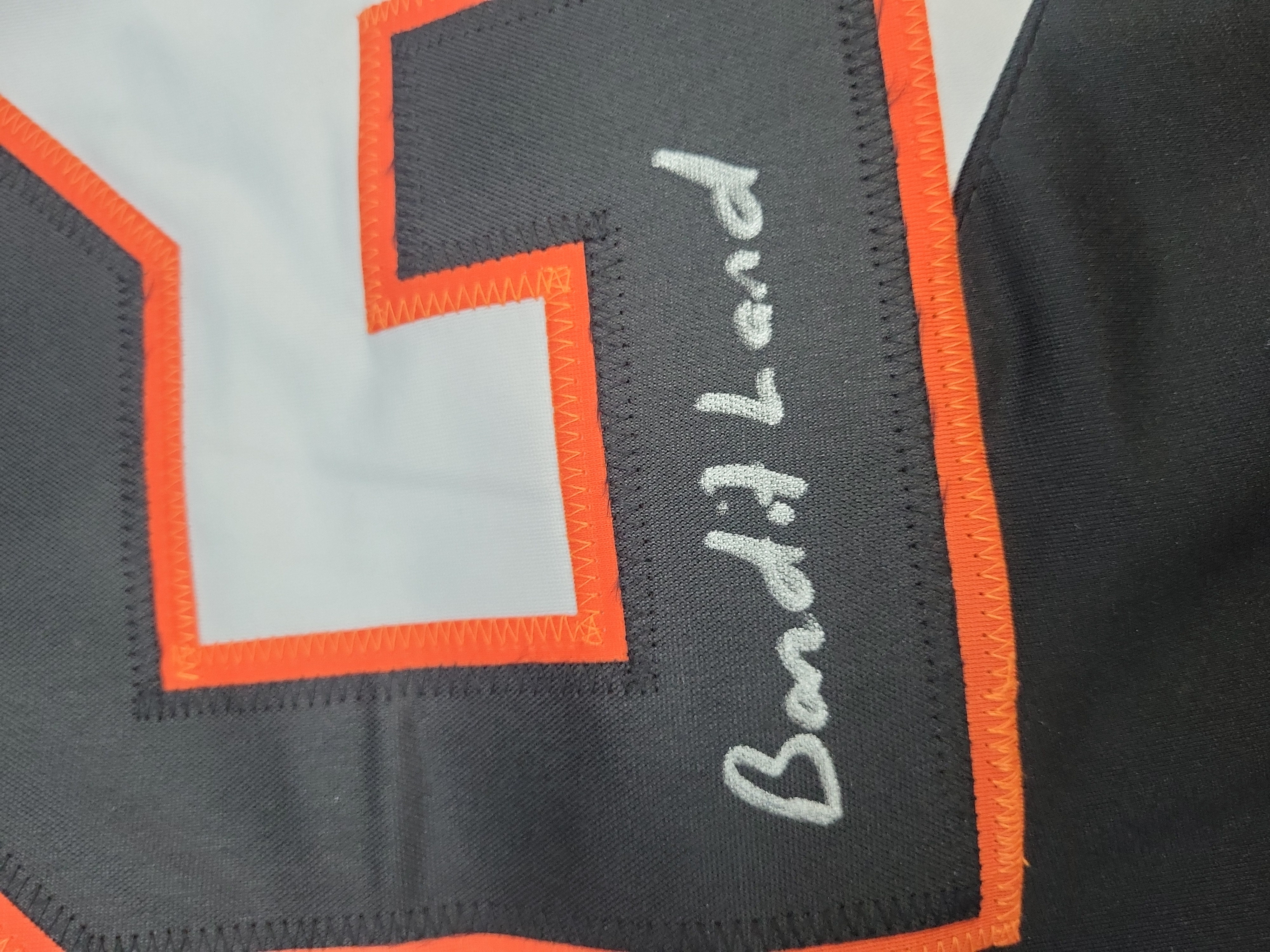 I03559 | Dhane Smith Signed Buffalo Bandits NLL Lacrosse Jersey with Inscriptions and JSA Authentication