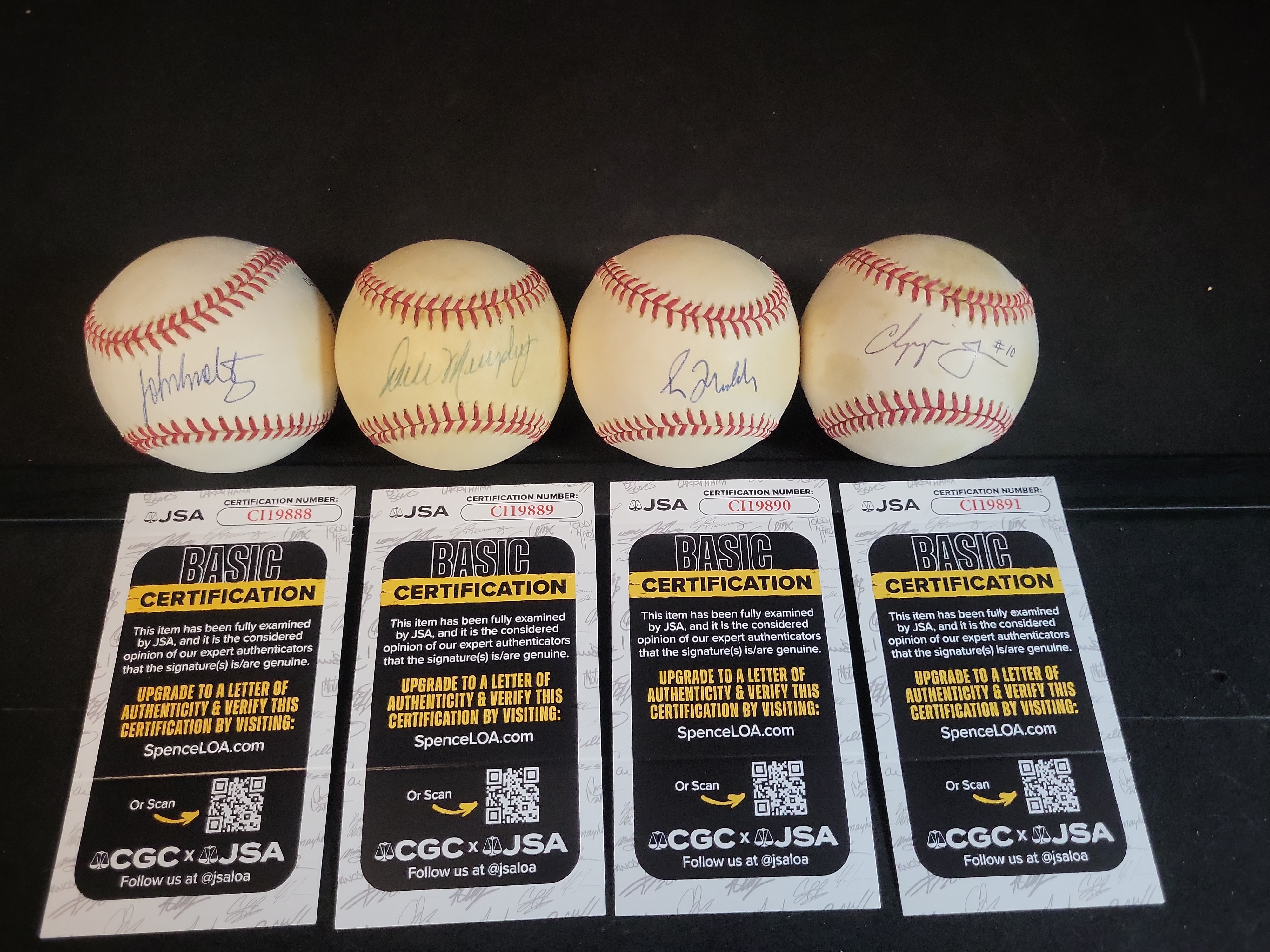 I03100 | A Collection of Four Autographed Atlanta Braves Baseballs with JSA Authentication