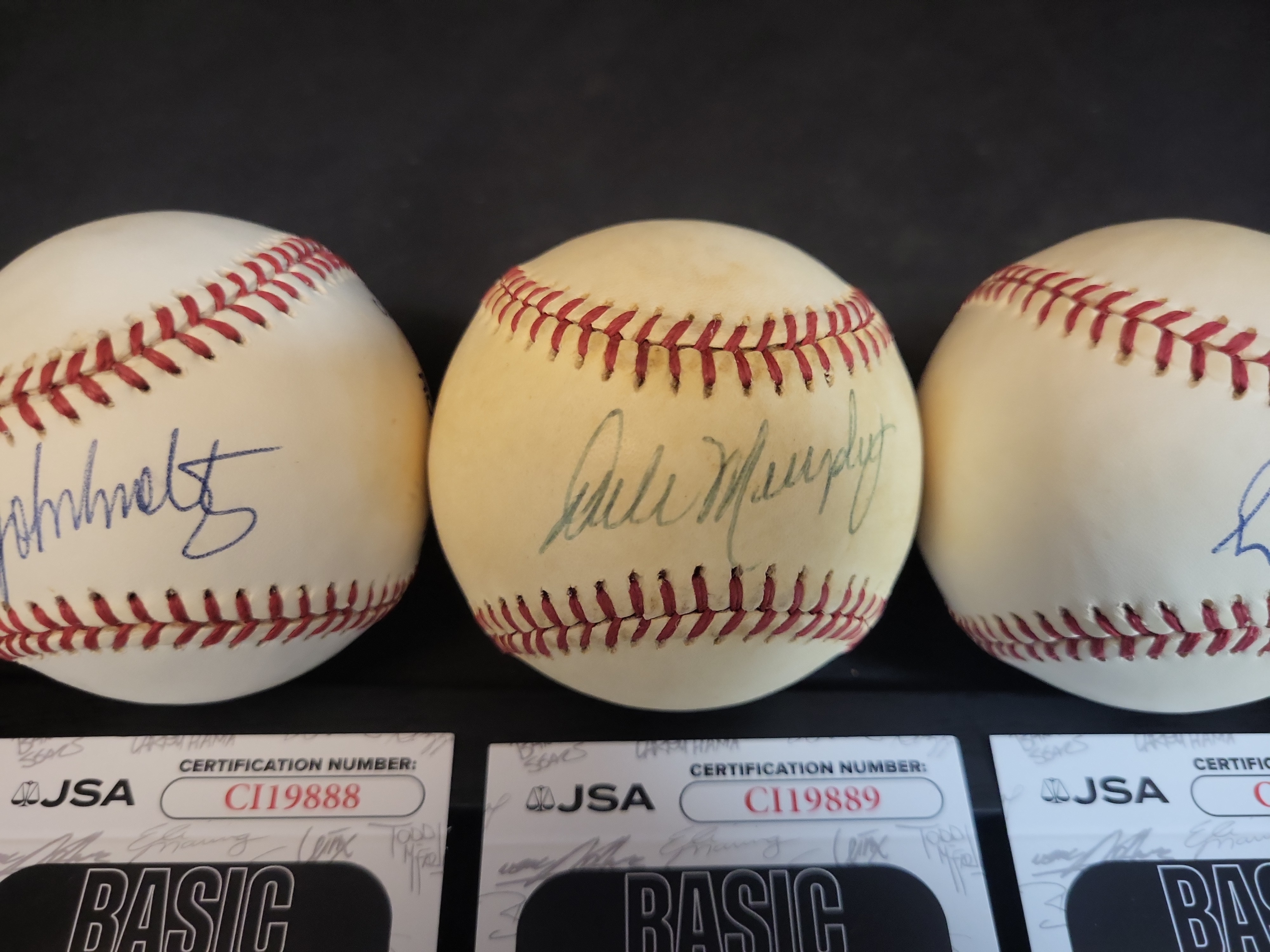 I03100 | A Collection of Four Autographed Atlanta Braves Baseballs with JSA Authentication