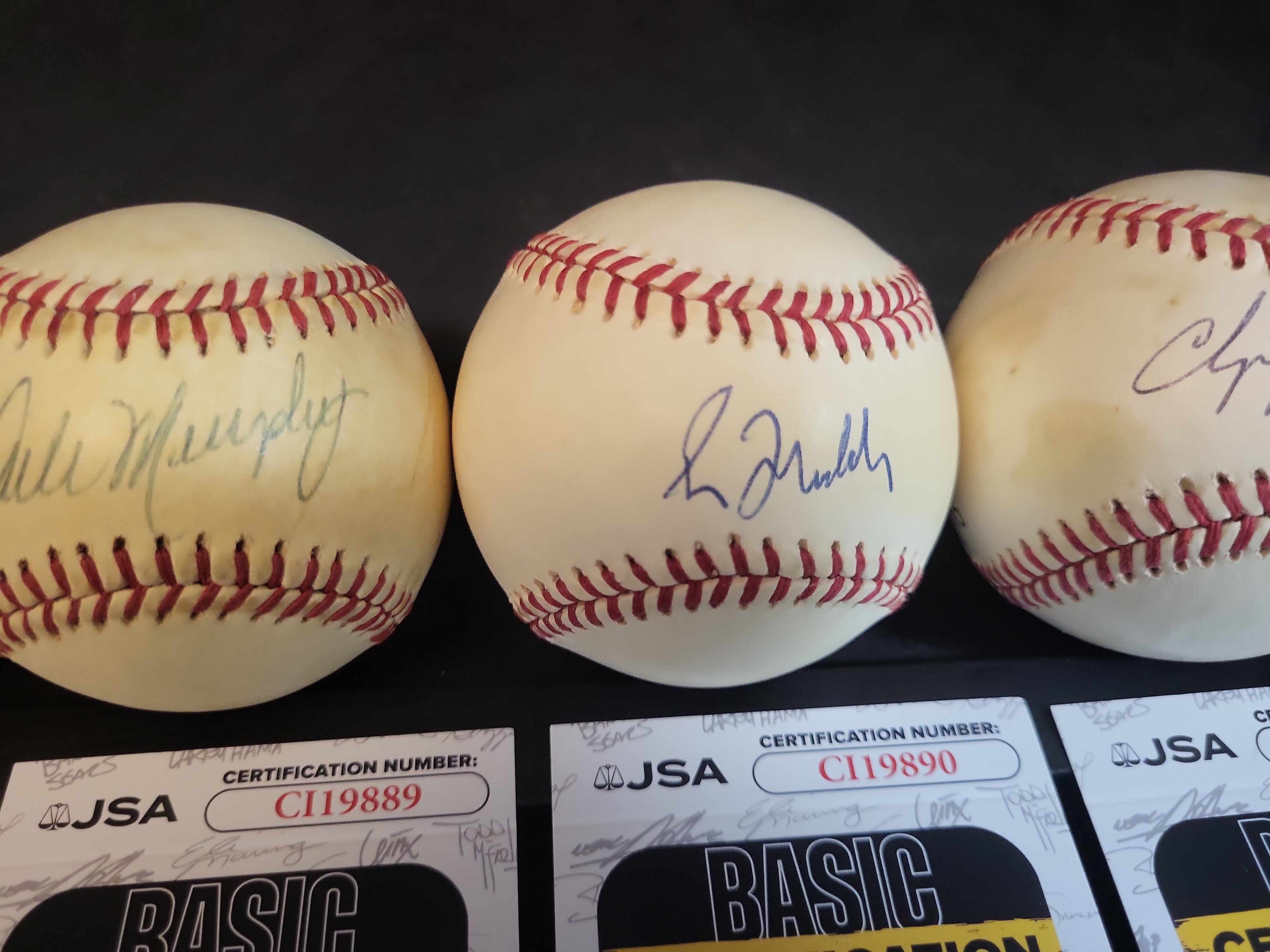 I03100 | A Collection of Four Autographed Atlanta Braves Baseballs with JSA Authentication