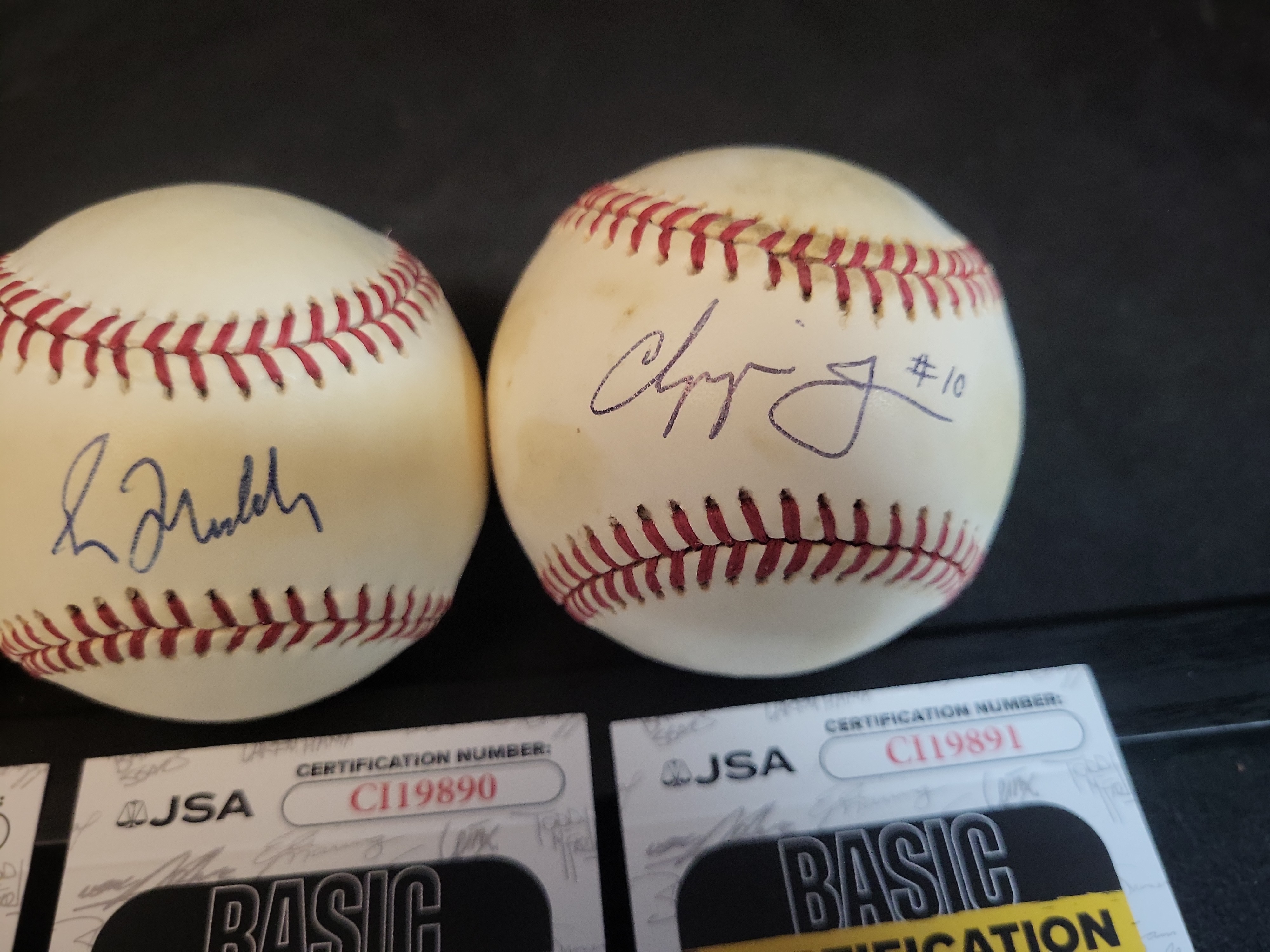 I03100 | A Collection of Four Autographed Atlanta Braves Baseballs with JSA Authentication