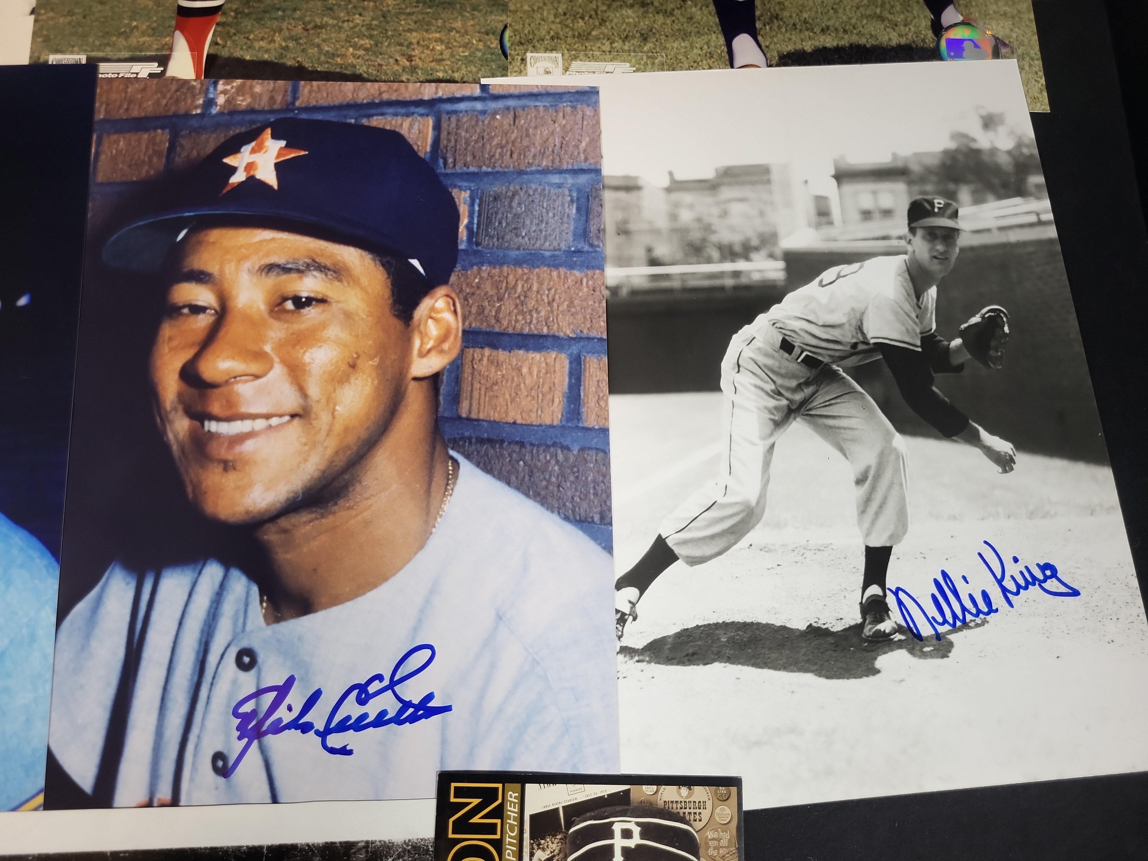 I03024 | A Collection of Signed Baseball Photographs and Memorabilia Featuring Bob Feller, Joe Maddon, and Others