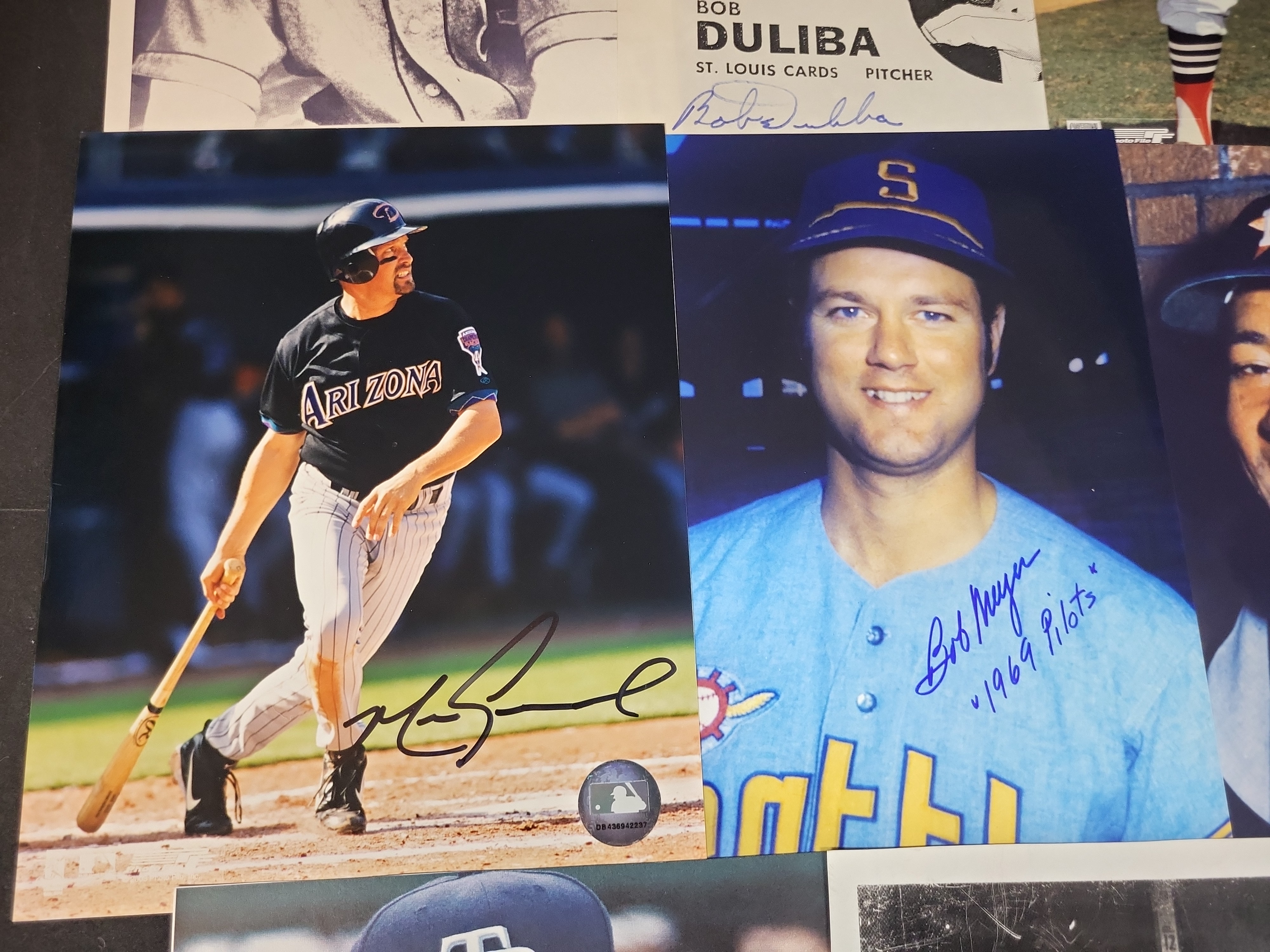 I03024 | A Collection of Signed Baseball Photographs and Memorabilia Featuring Bob Feller, Joe Maddon, and Others