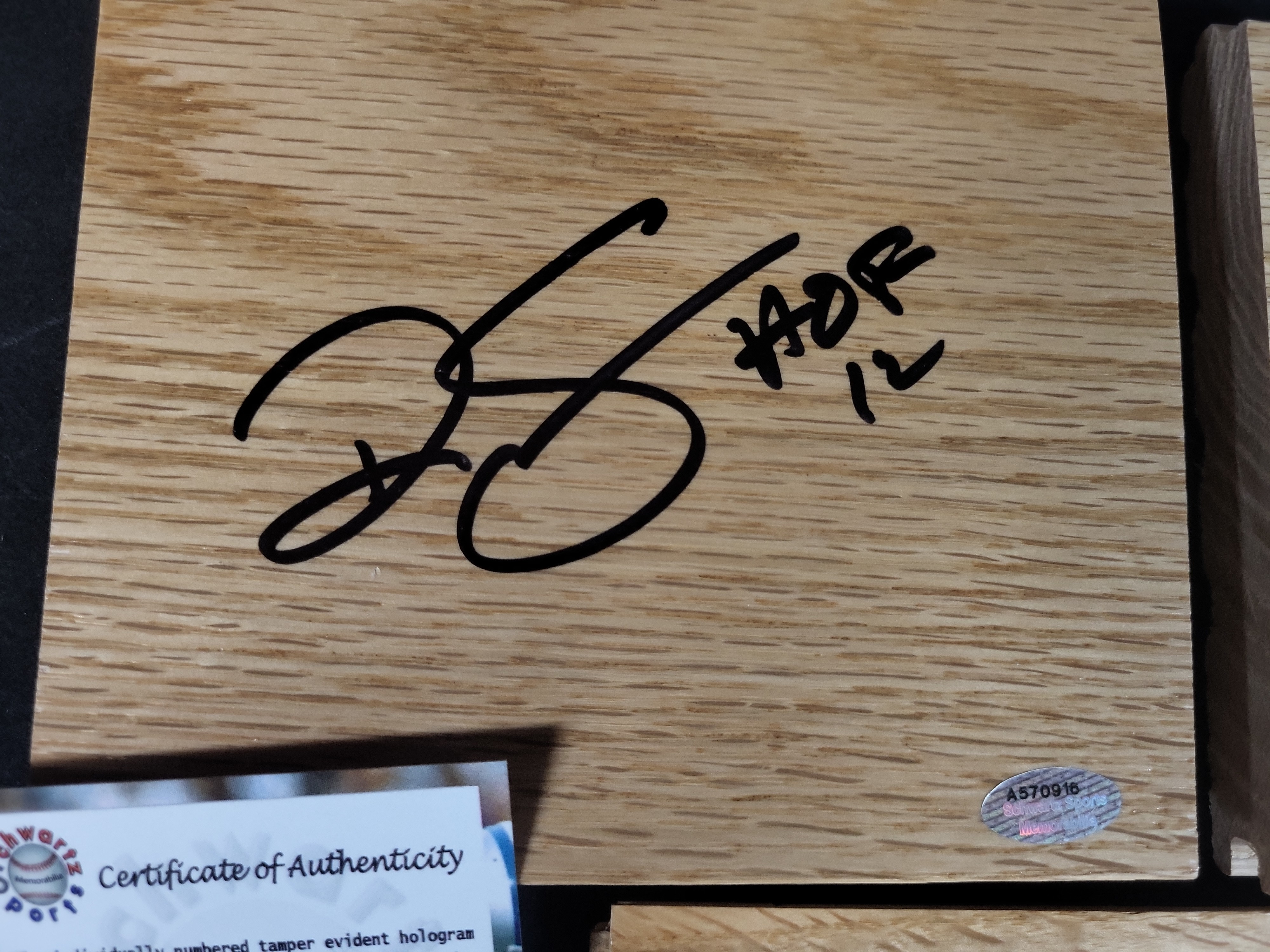 I03107 | A Collection of Signed and Authenticated NBA Memorabilia Including a Commemorative Poster and Floor Segments
