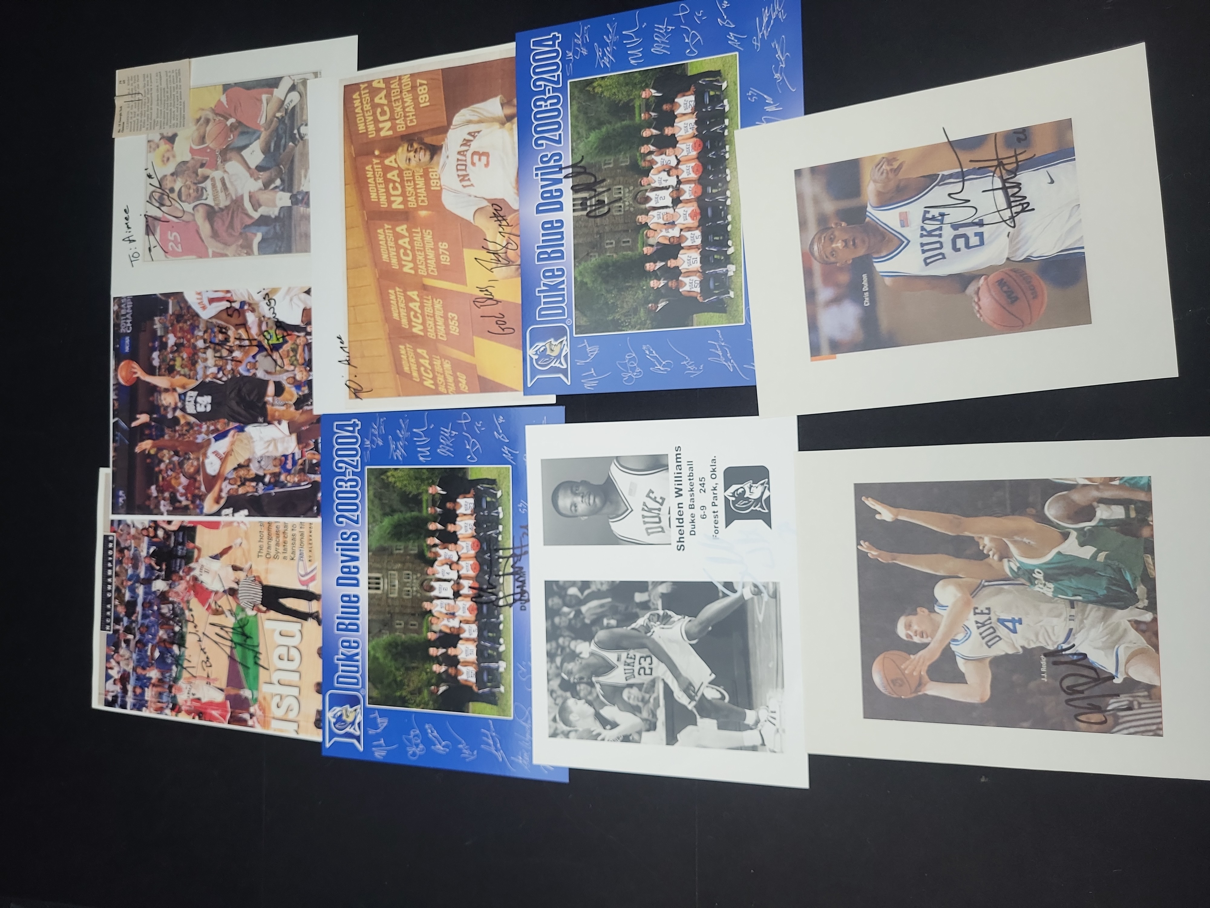 I03008 | A Collection of Autographed NCAA Men's Basketball Photographs and Memorabilia