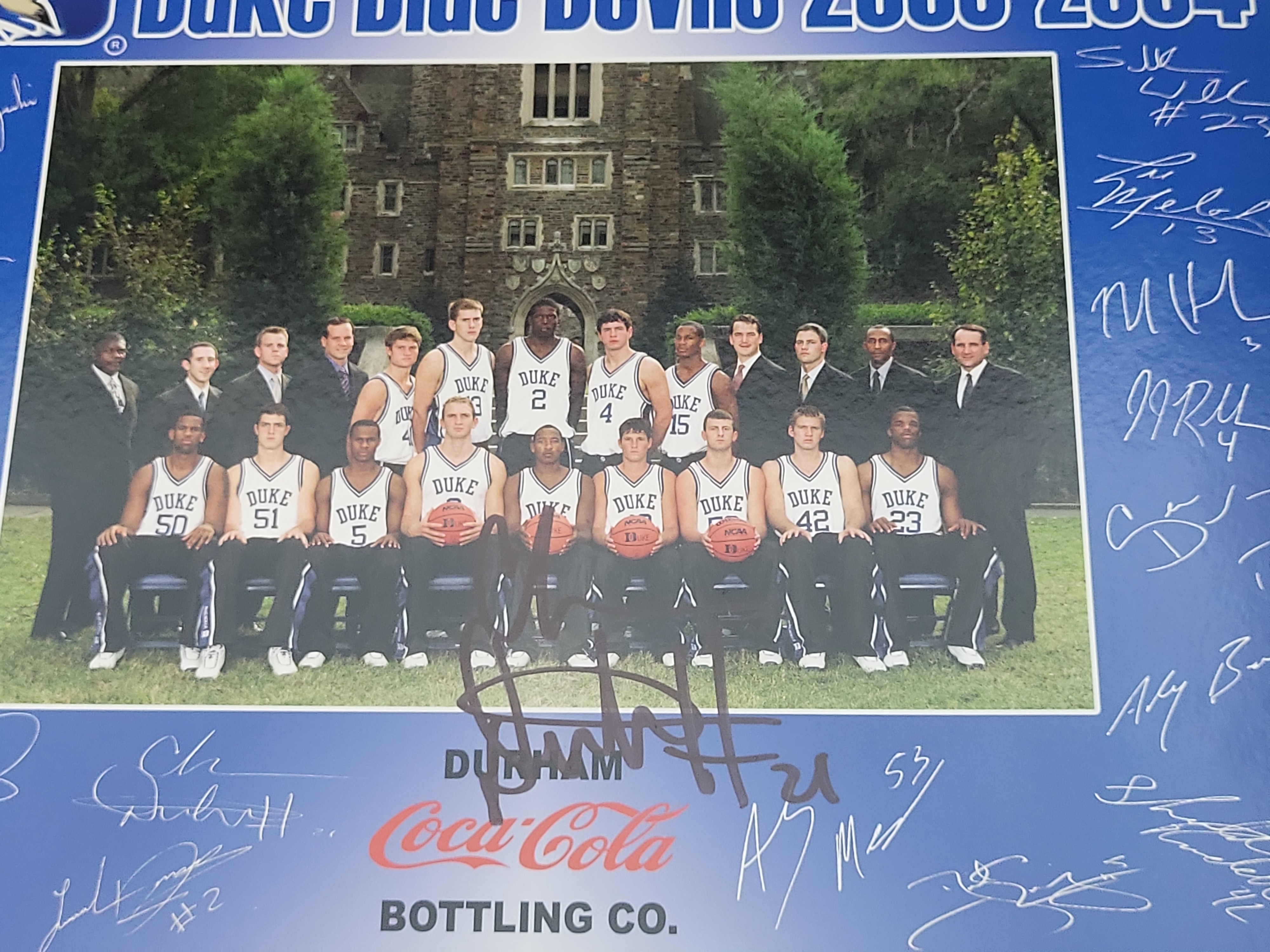 I03008 | A Collection of Autographed NCAA Men's Basketball Photographs and Memorabilia