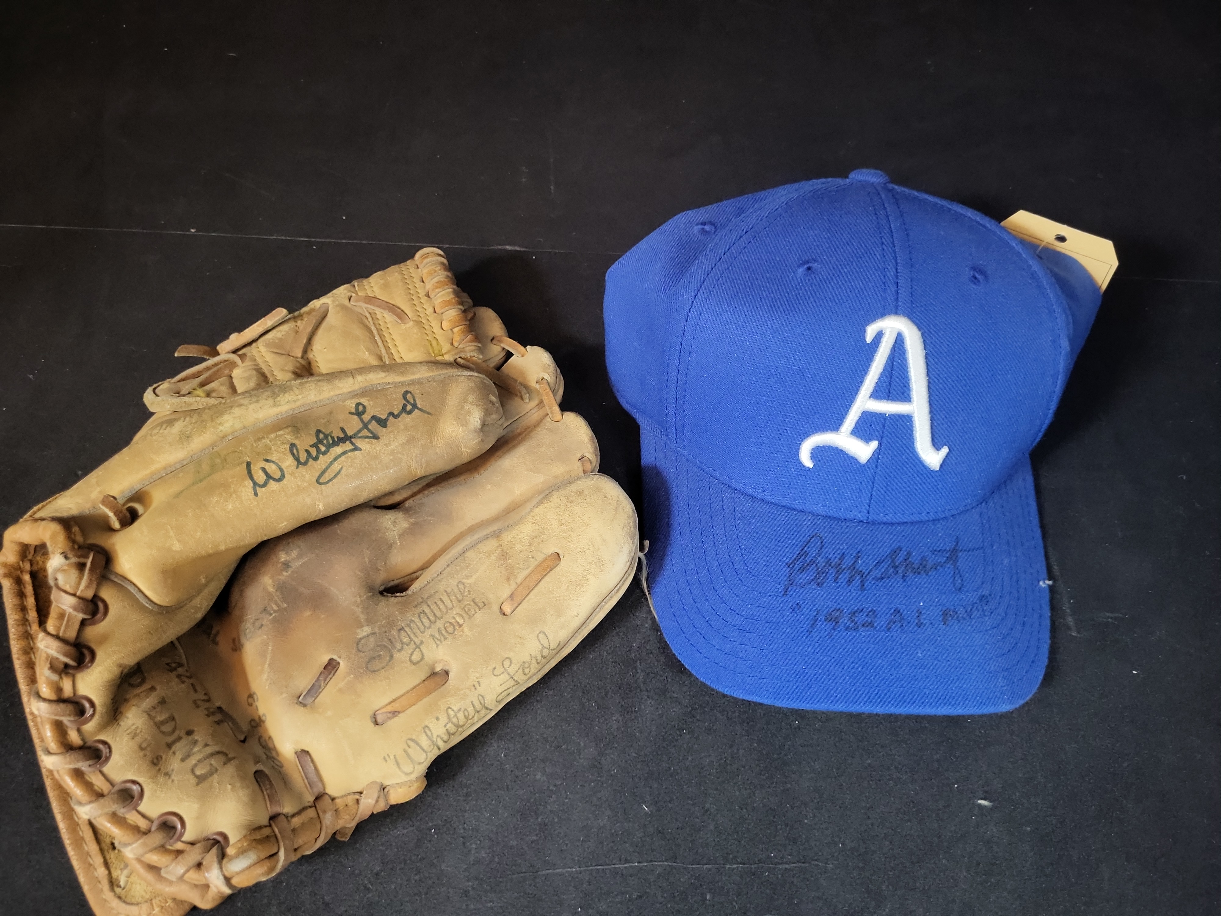 I03055 | Two Pieces of Signed Baseball Memorabilia Featuring a Whitey Ford Model Glove and a Bobby Shantz Signed Philadelphia Athletics Cap