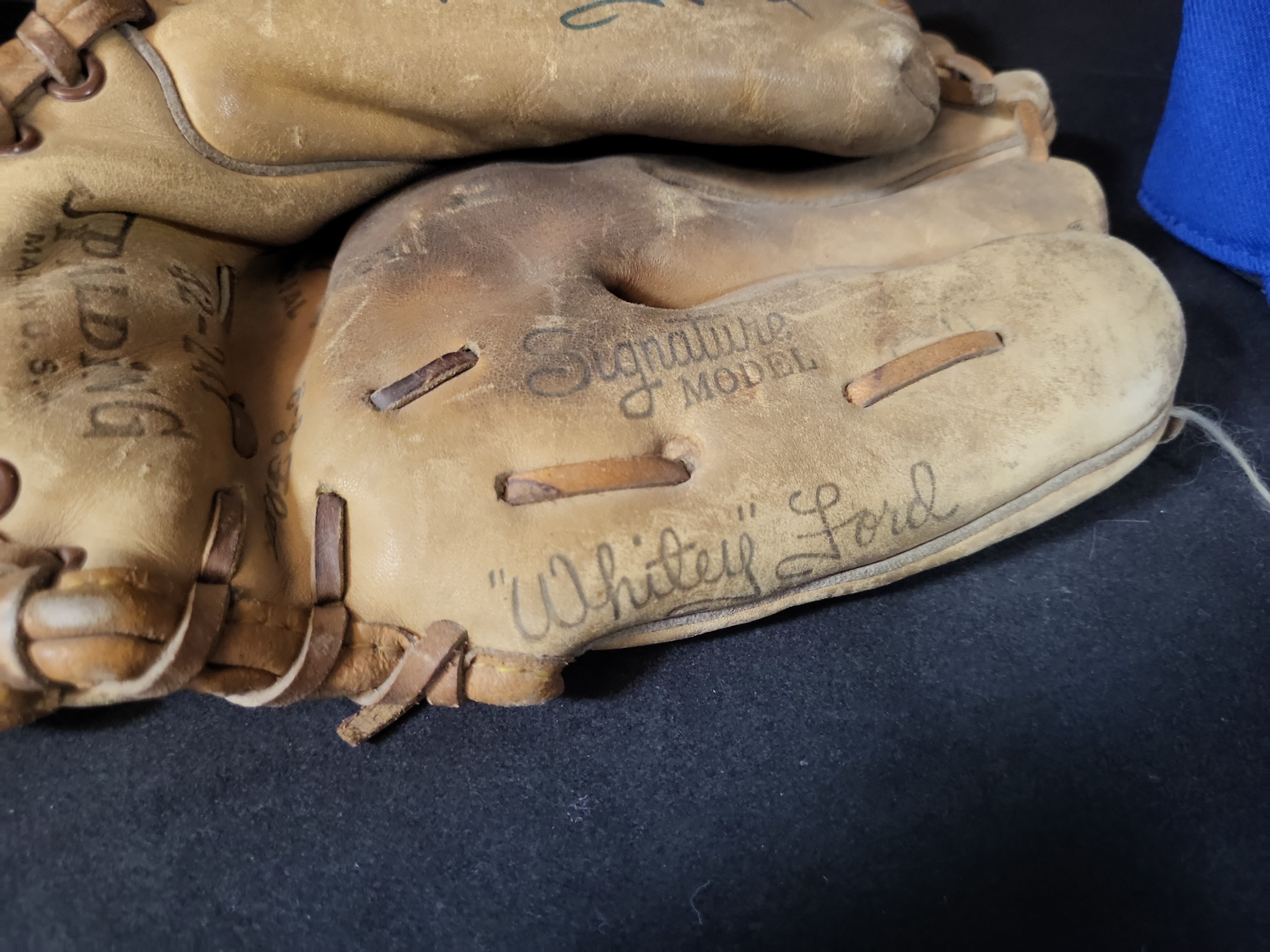 I03055 | Two Pieces of Signed Baseball Memorabilia Featuring a Whitey Ford Model Glove and a Bobby Shantz Signed Philadelphia Athletics Cap