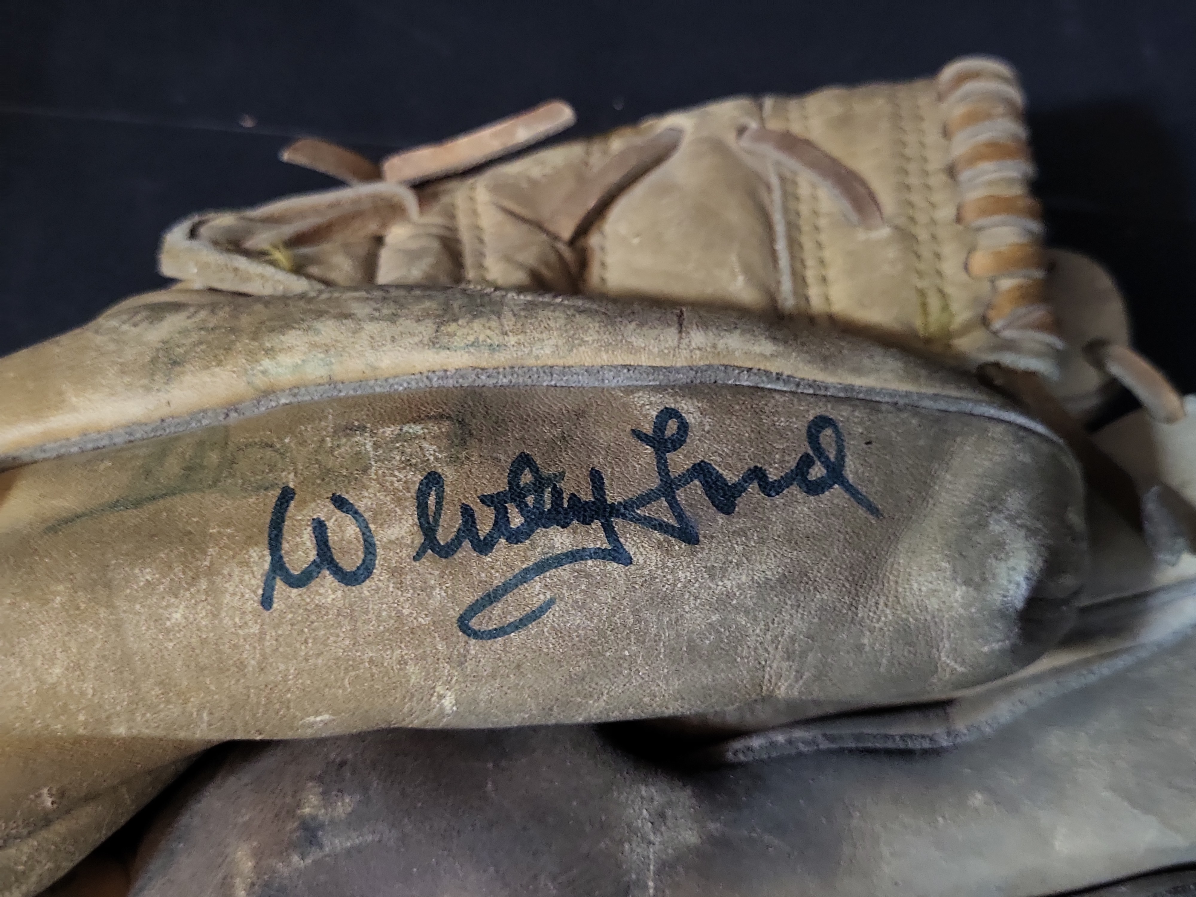 I03055 | Two Pieces of Signed Baseball Memorabilia Featuring a Whitey Ford Model Glove and a Bobby Shantz Signed Philadelphia Athletics Cap