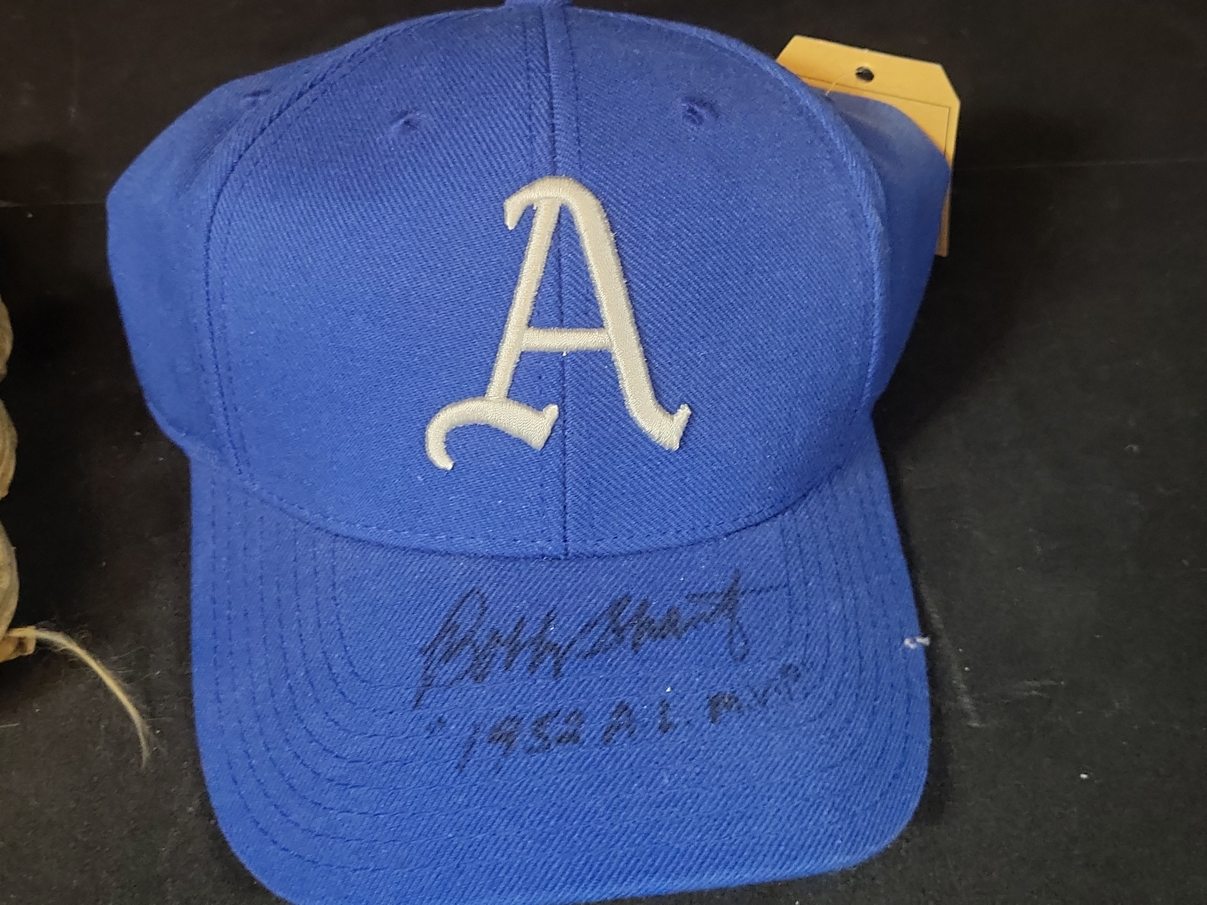 I03055 | Two Pieces of Signed Baseball Memorabilia Featuring a Whitey Ford Model Glove and a Bobby Shantz Signed Philadelphia Athletics Cap