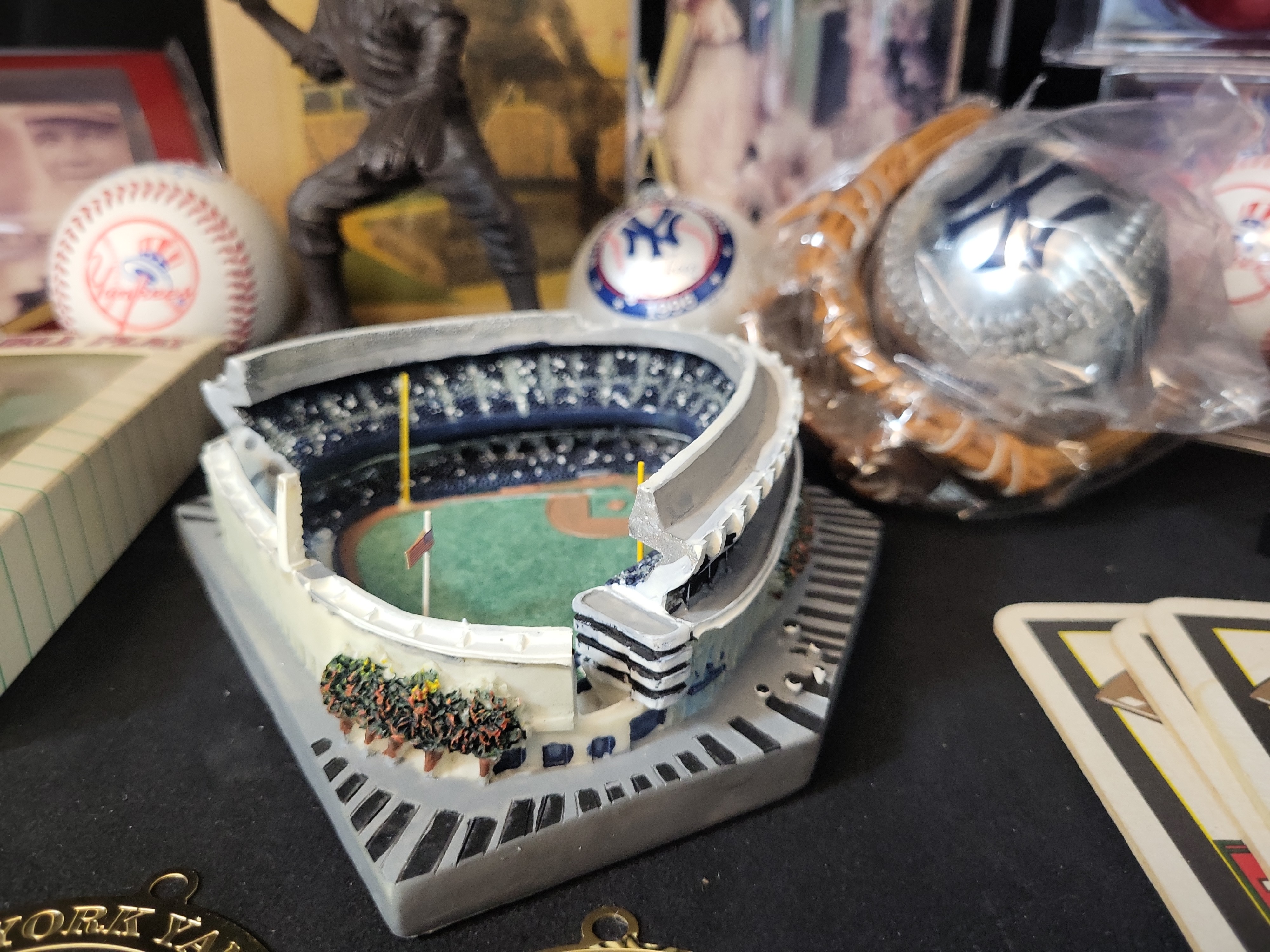 I03057 | An Assortment of New York Yankees Commemorative Memorabilia and Fan Collectibles