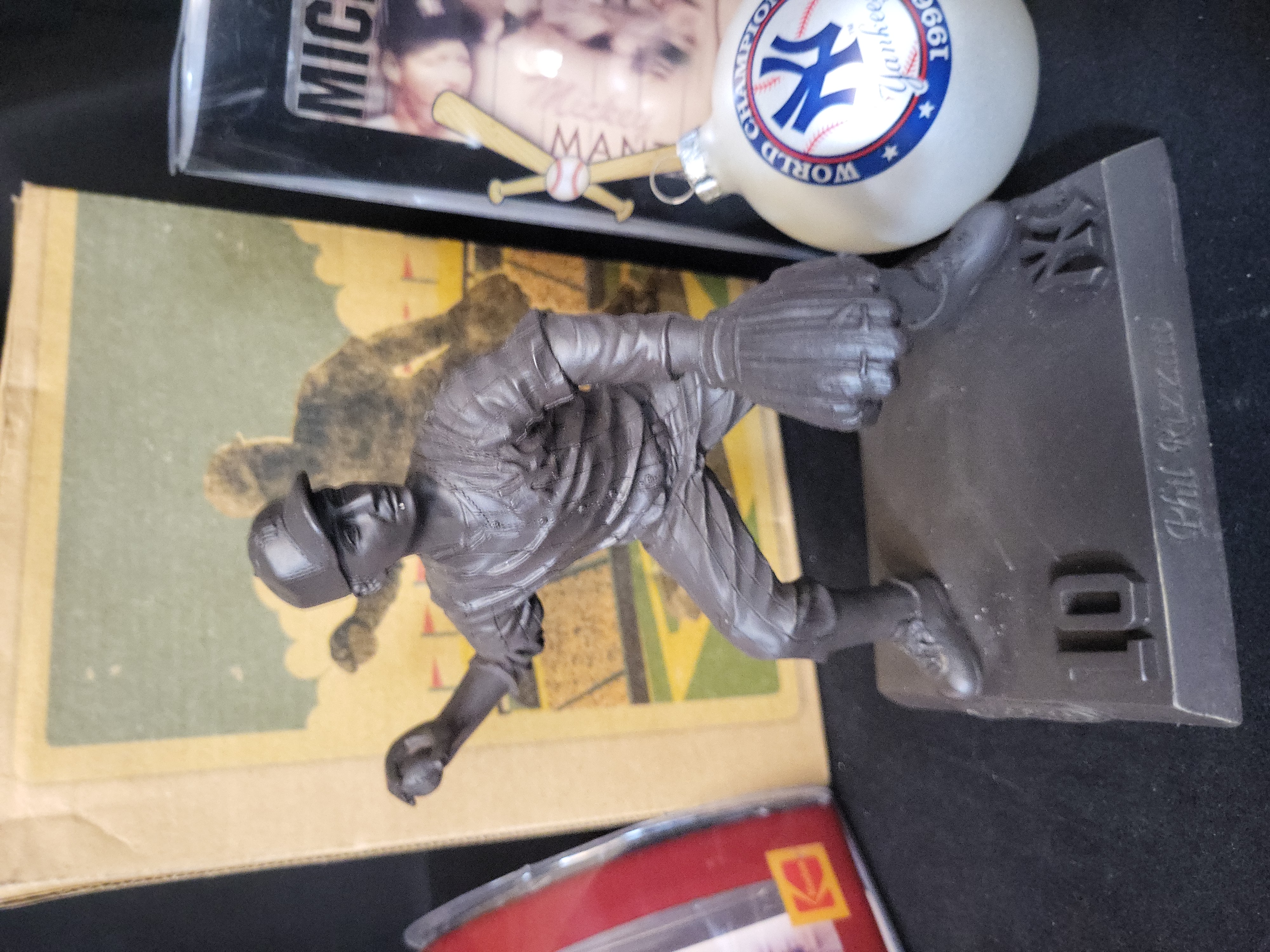 I03057 | An Assortment of New York Yankees Commemorative Memorabilia and Fan Collectibles