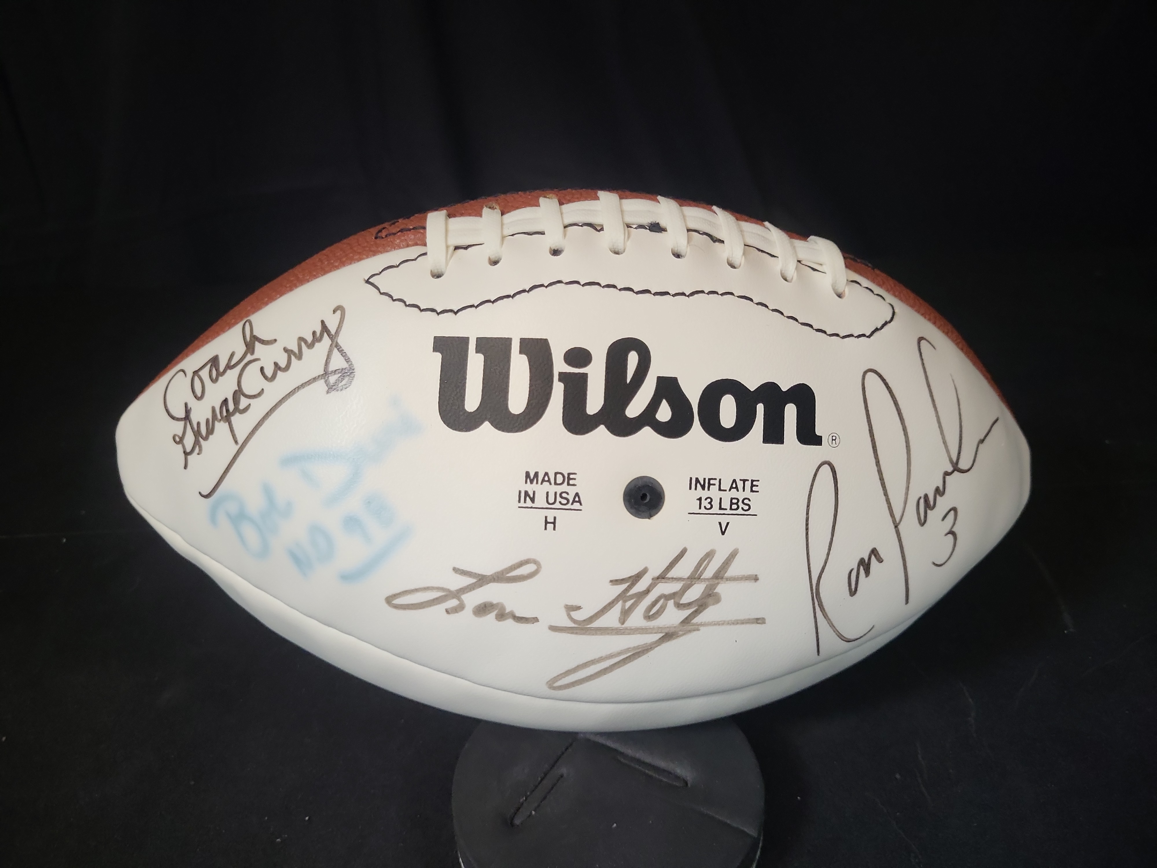 I03068 | Wilson NFL Multi Signed Football Featuring Lou Holtz Ron Powlus and Coach George Curry