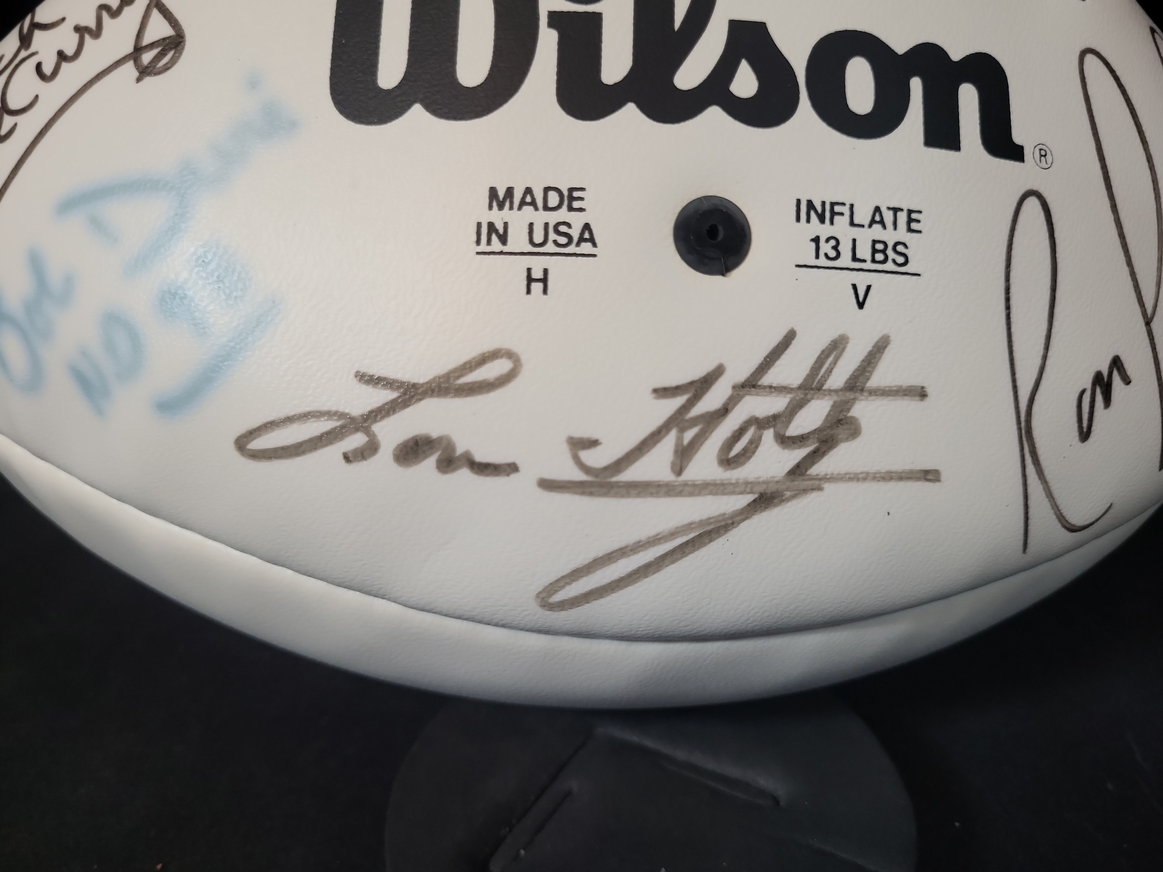 I03068 | Wilson NFL Multi Signed Football Featuring Lou Holtz Ron Powlus and Coach George Curry
