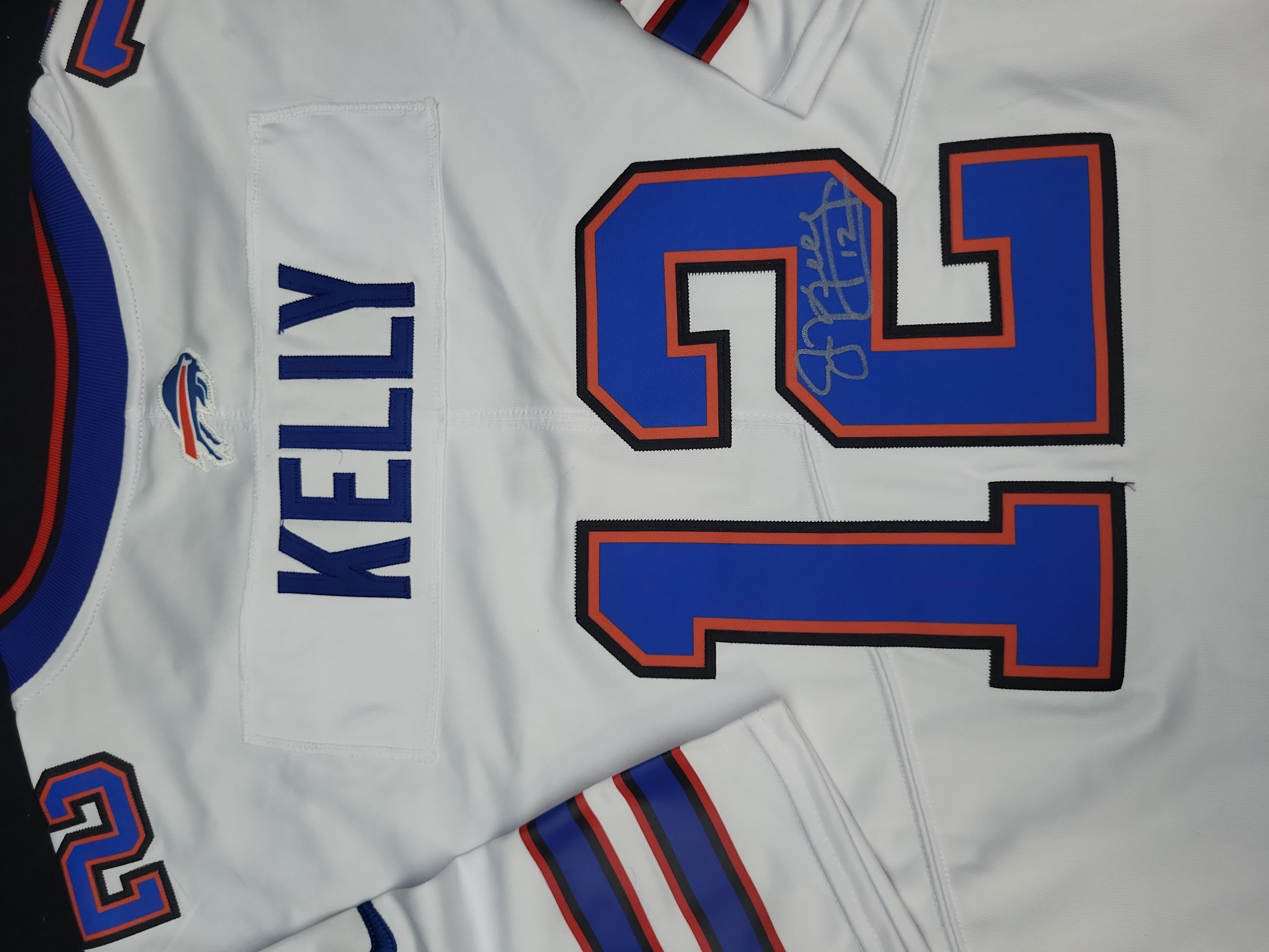 I03560 | Jim Kelly Signed Buffalo Bills Nike Onfield White Jersey