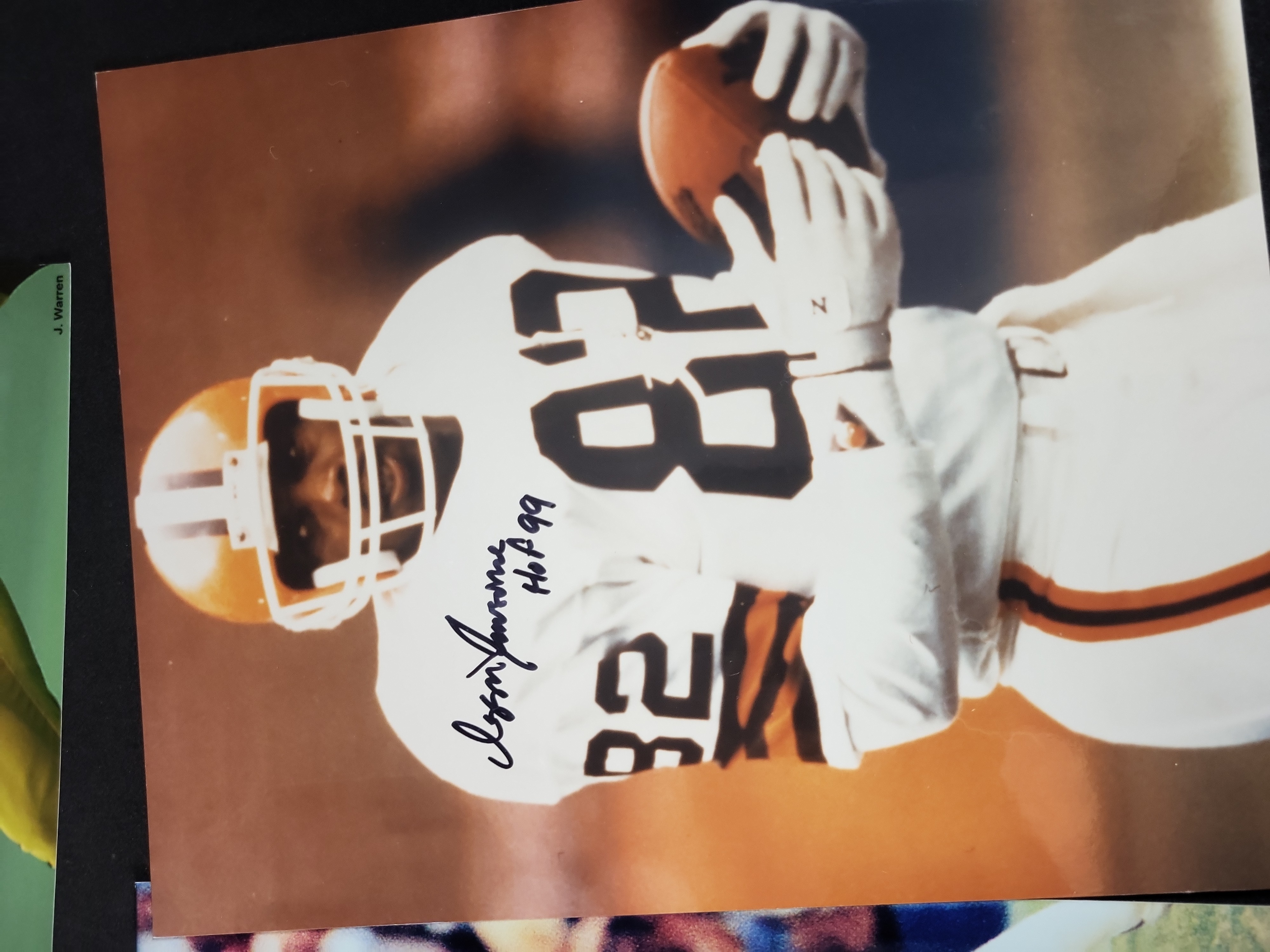 I03021 | A Collection of Six NFL Signed Photographs and Football Memorabilia Including Roger Staubach and Ozzie Newsome