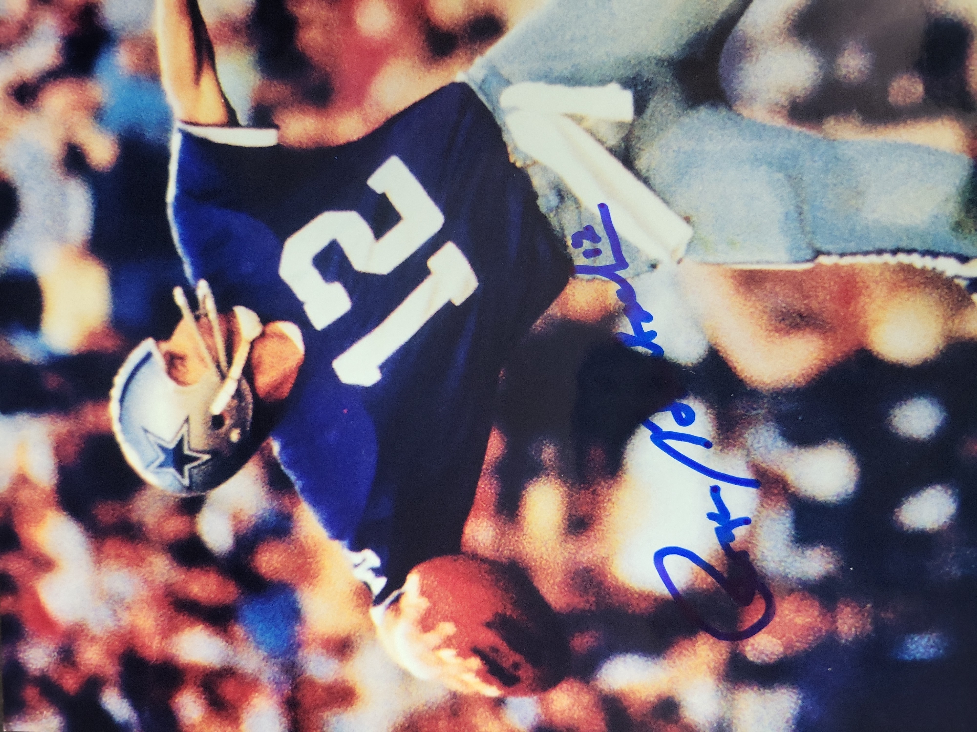 I03021 | A Collection of Six NFL Signed Photographs and Football Memorabilia Including Roger Staubach and Ozzie Newsome