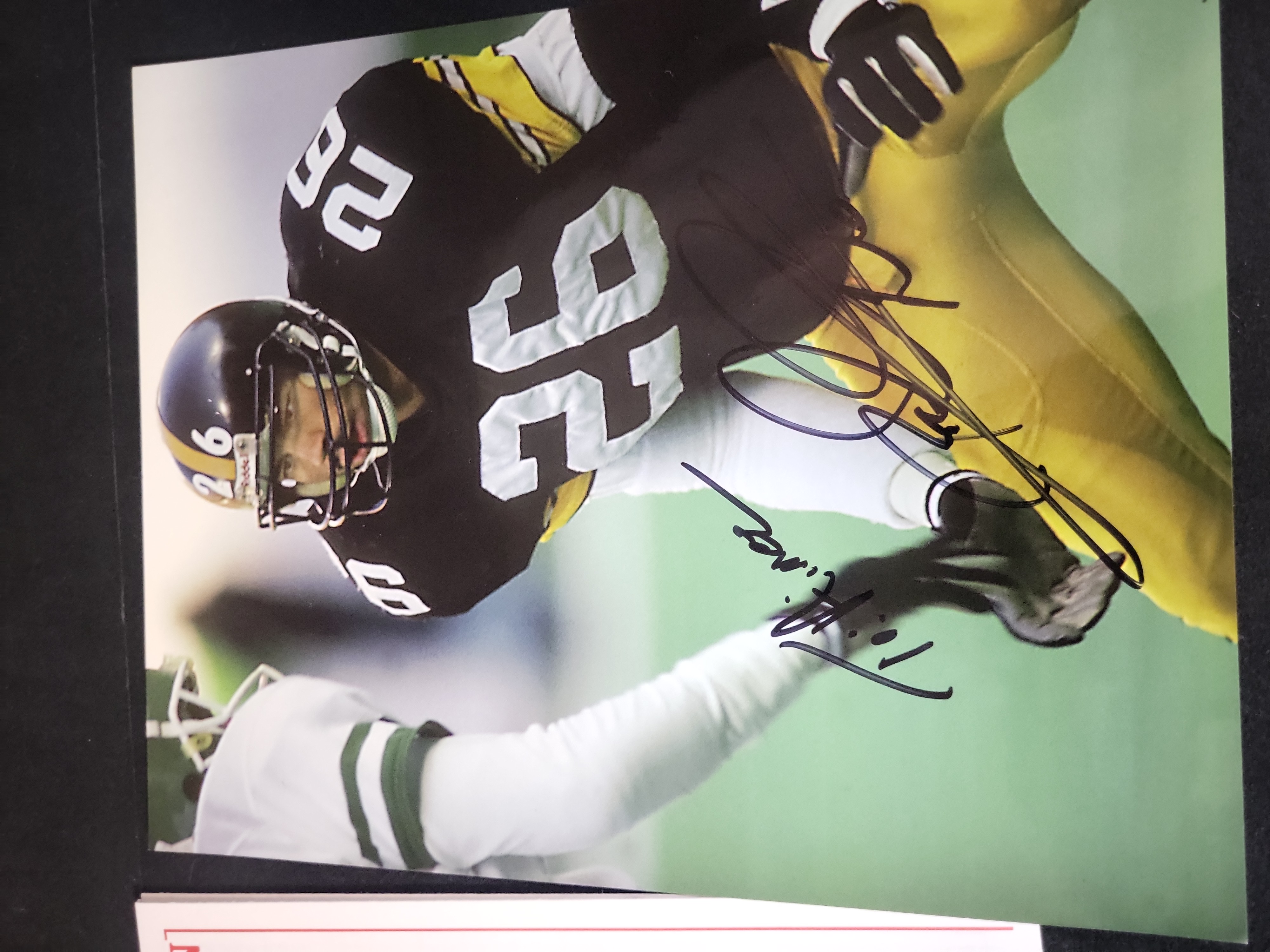 I03021 | A Collection of Six NFL Signed Photographs and Football Memorabilia Including Roger Staubach and Ozzie Newsome