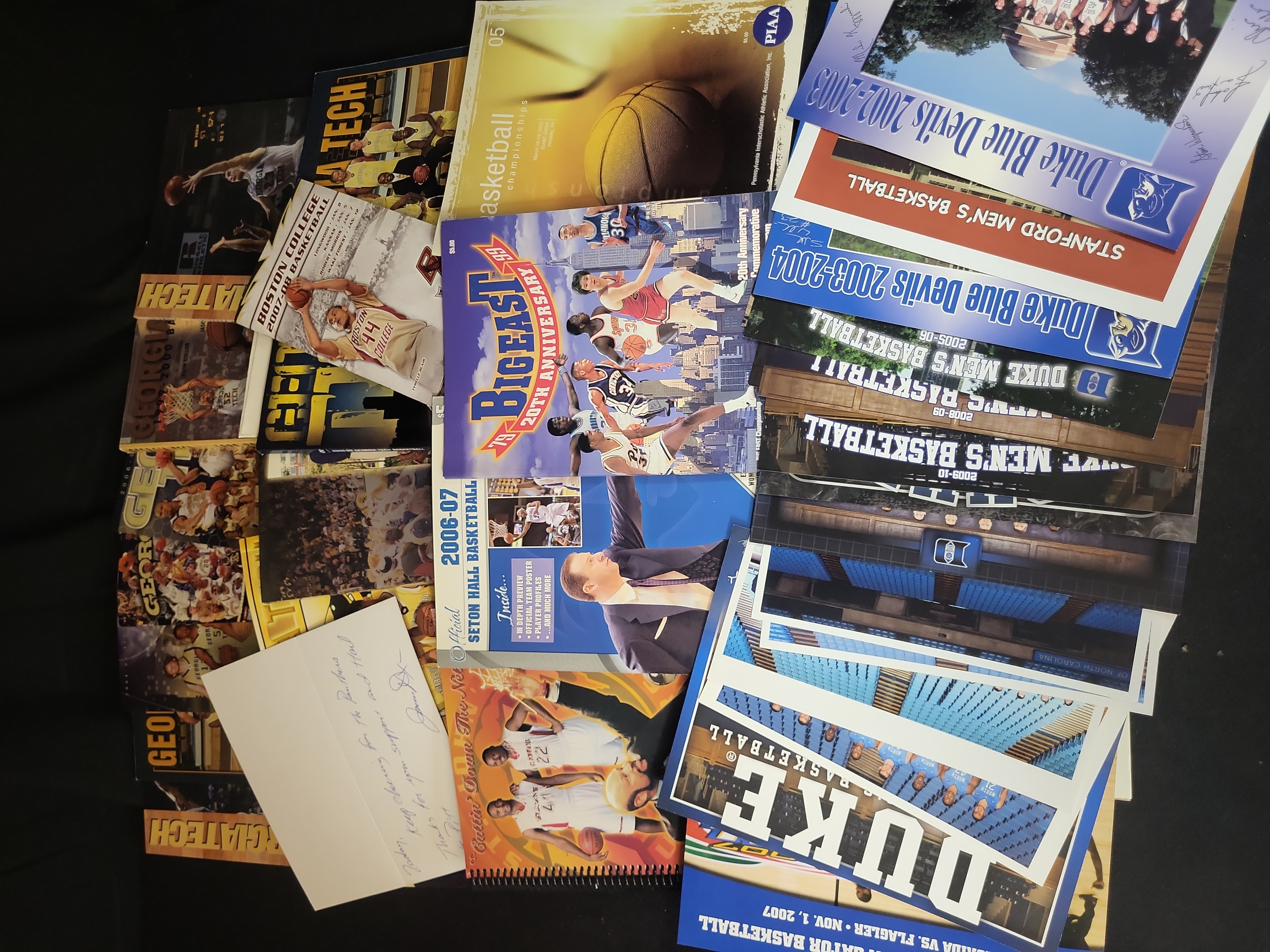 I03049 | A Collection of NCAA Basketball Media Guides, Commemorative Programs, and Autographed Ephemera