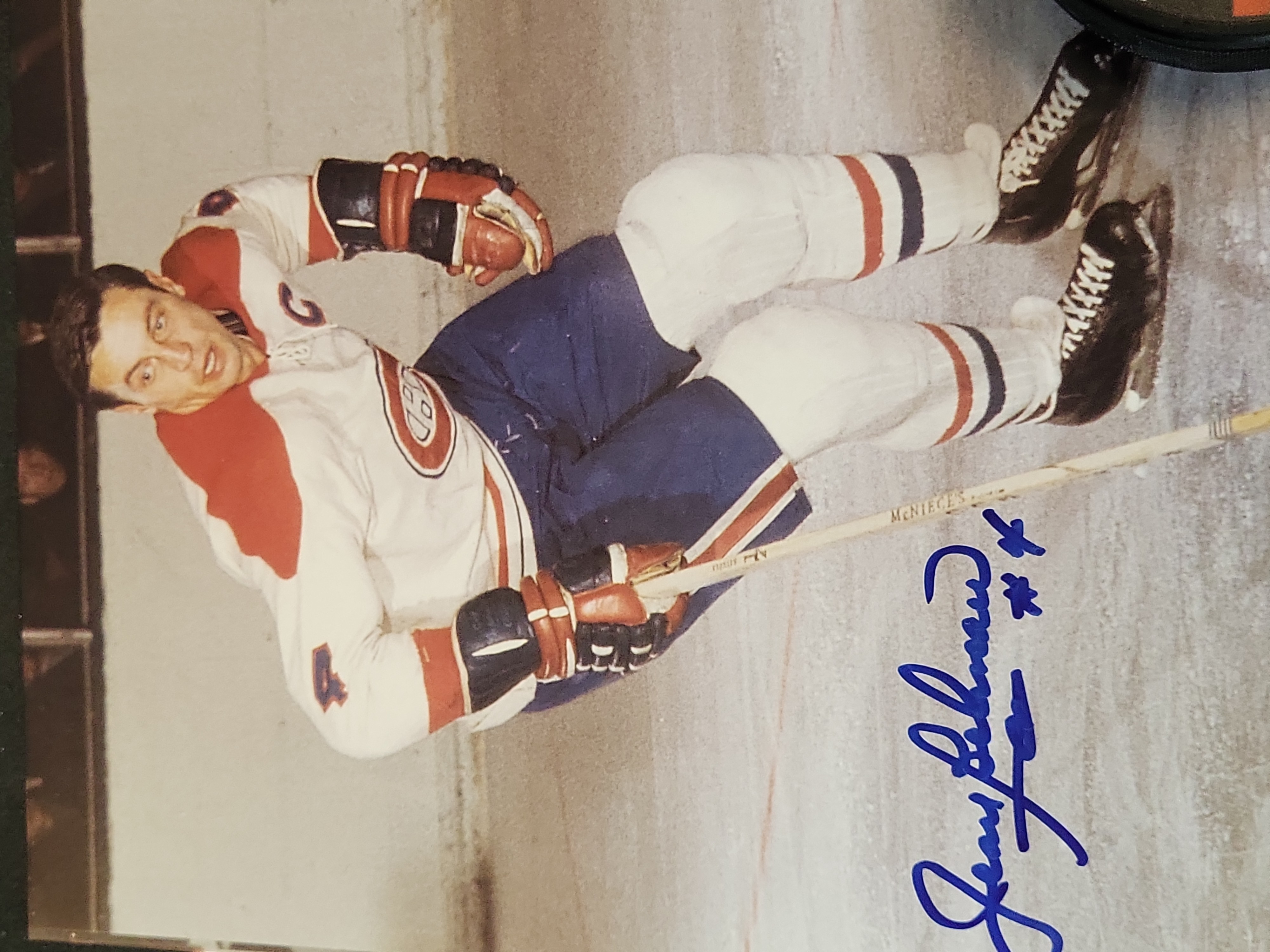 I03445 | A Collection of Professional Hockey Memorabilia Featuring Autographed Items and Trading Cards
