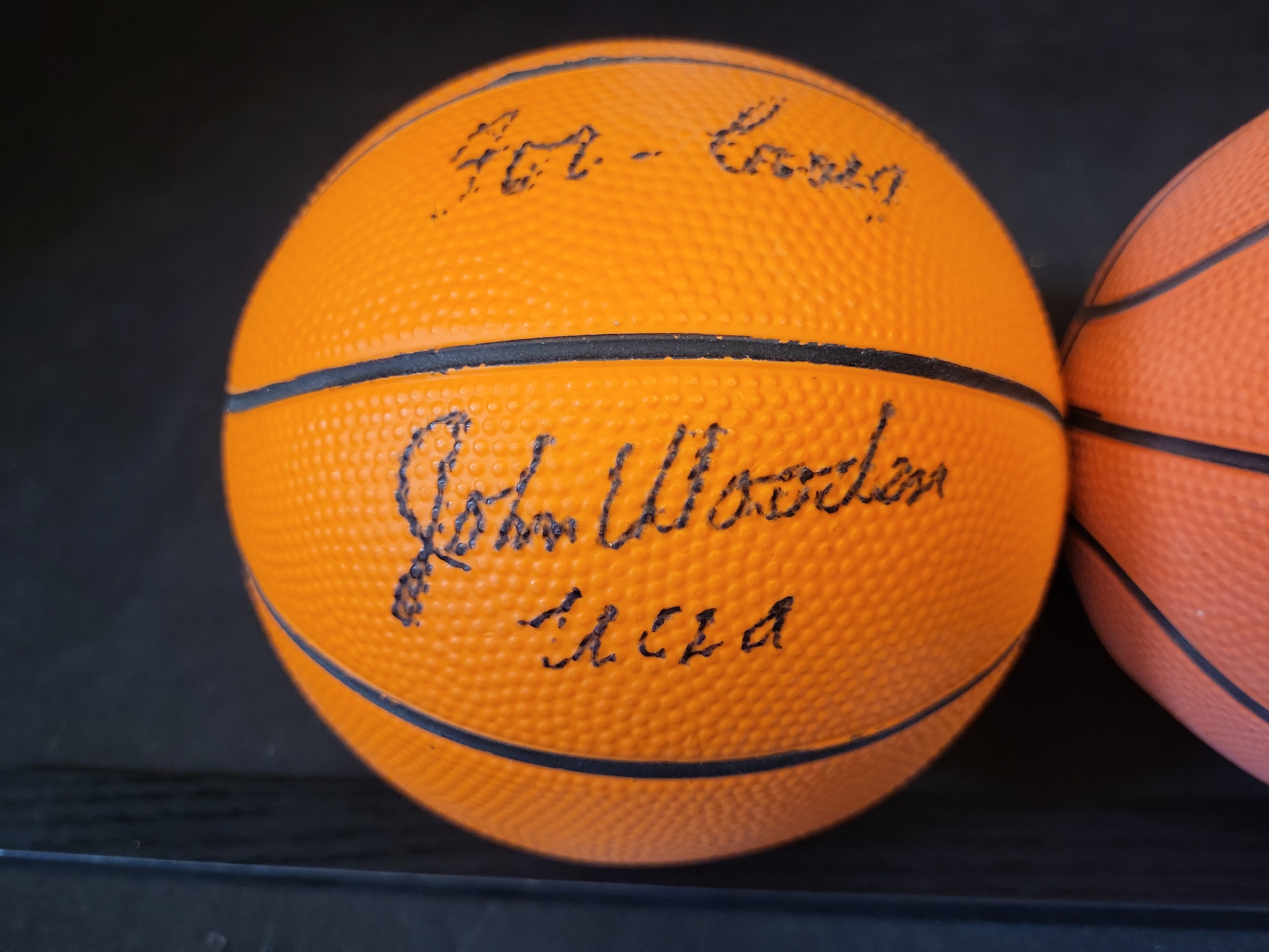 I03444 | A Trio of Autographed Basketball Legend Mini-Basketballs Including John Wooden, Bob Pettit, and Rick Barry with JSA COAs
