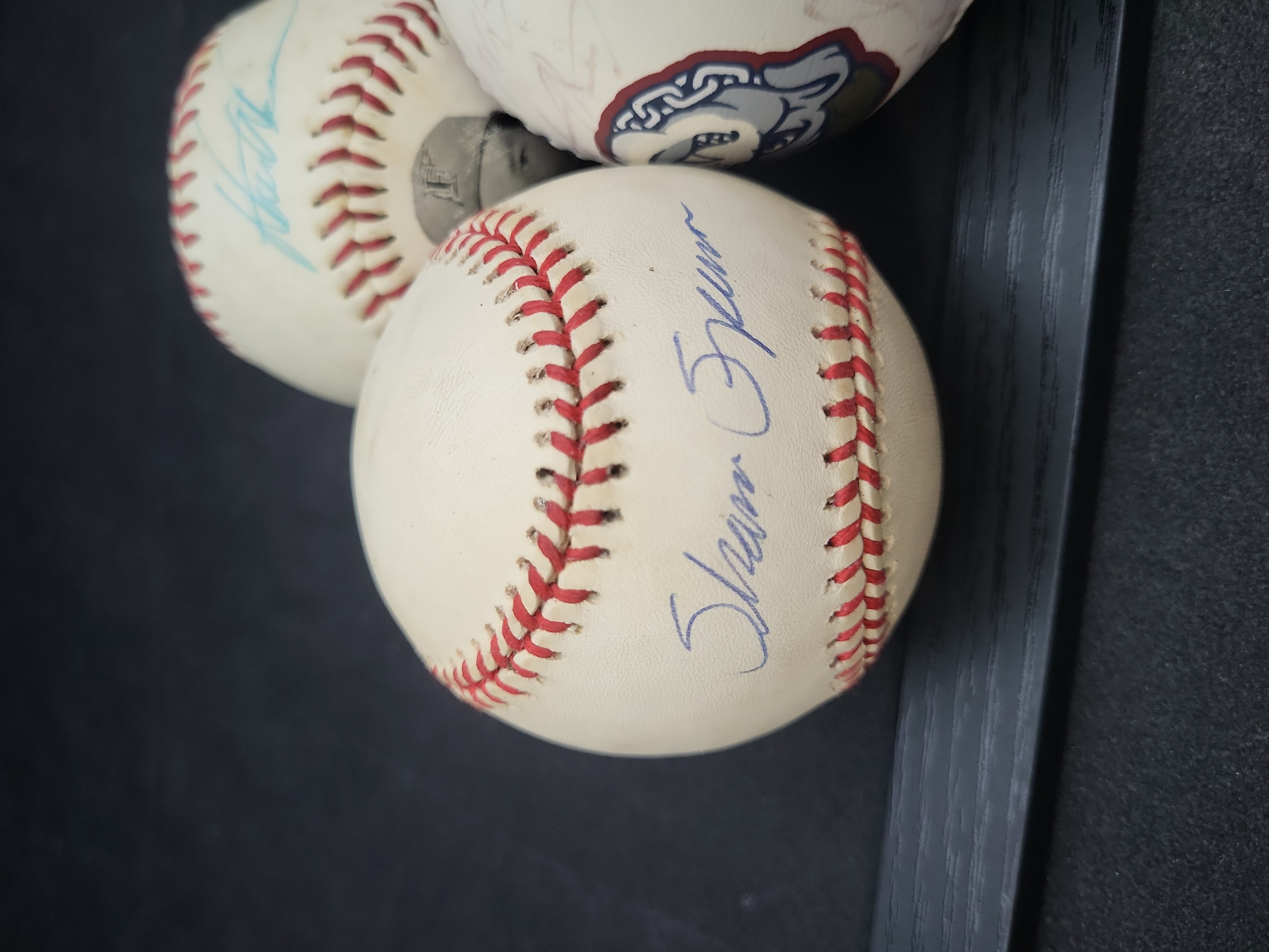 I03356 | A Collection of Seven Autographed and Novelty Baseballs Including Dale Earnhardt and Jack Clark