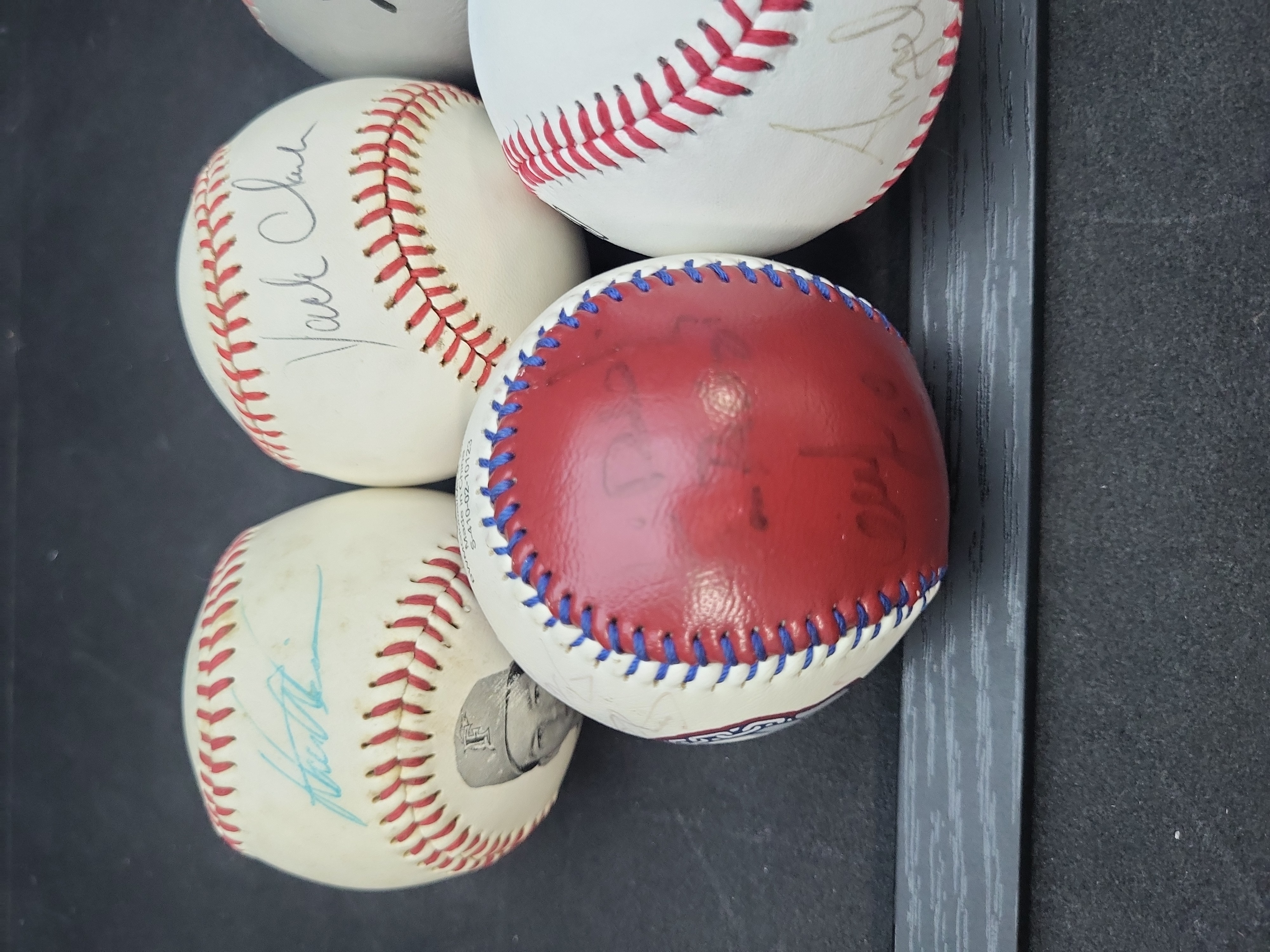 I03356 | A Collection of Seven Autographed and Novelty Baseballs Including Dale Earnhardt and Jack Clark