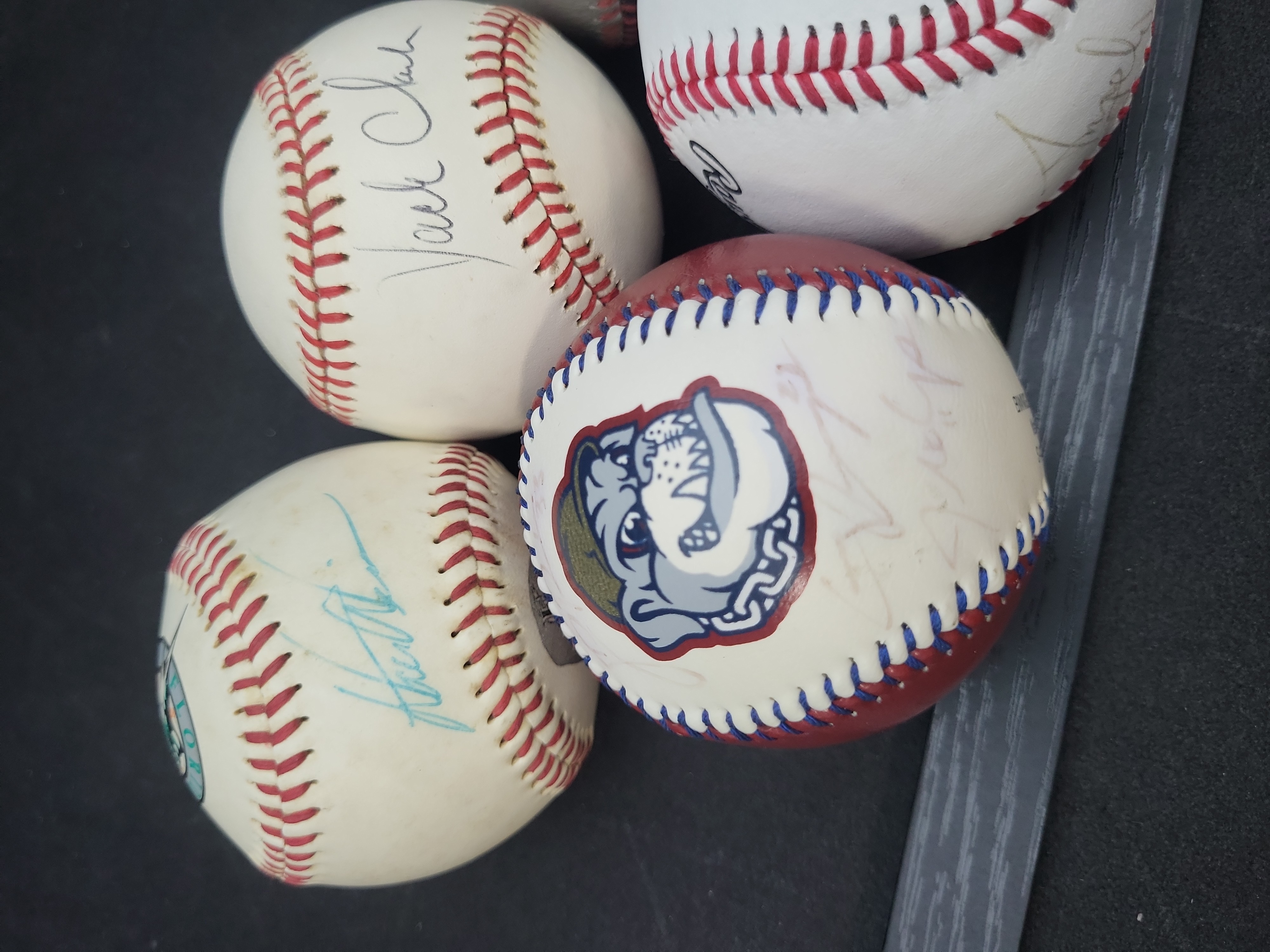 I03356 | A Collection of Seven Autographed and Novelty Baseballs Including Dale Earnhardt and Jack Clark
