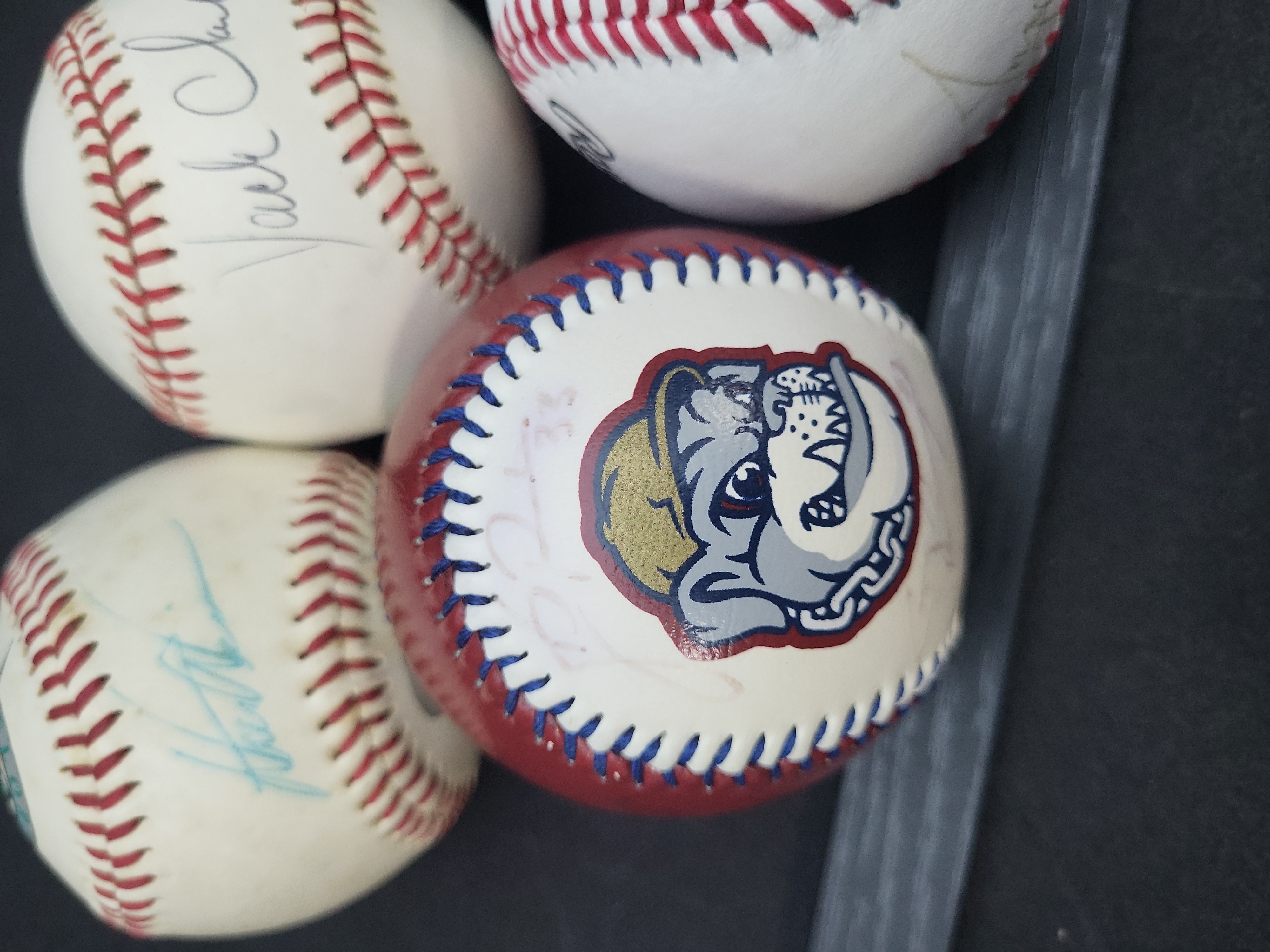 I03356 | A Collection of Seven Autographed and Novelty Baseballs Including Dale Earnhardt and Jack Clark