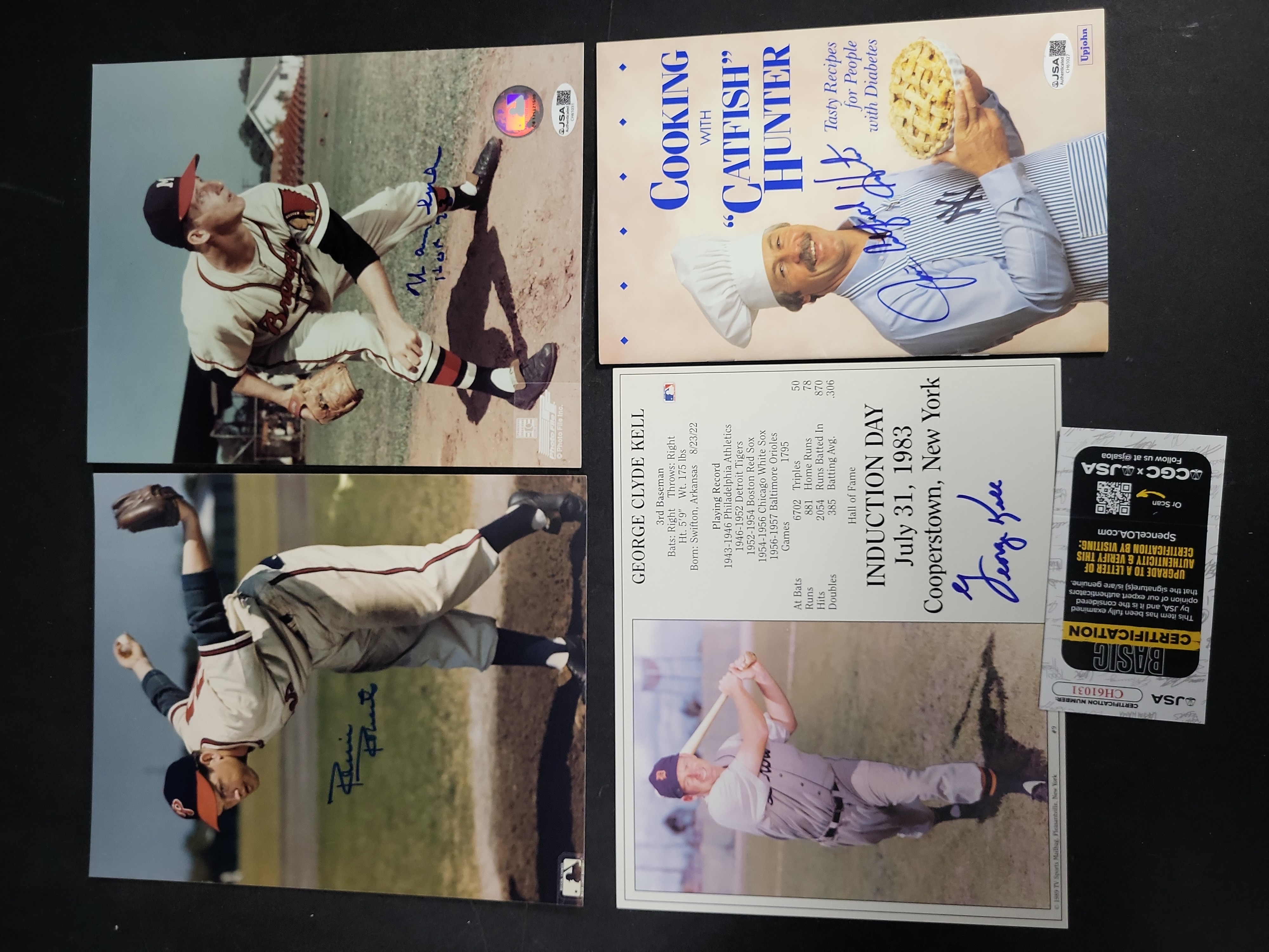 I03407 | A Collection of Autographed Baseball Memorabilia Featuring Hall of Famers Warren Spahn, Robin Roberts, Catfish Hunter, and George K