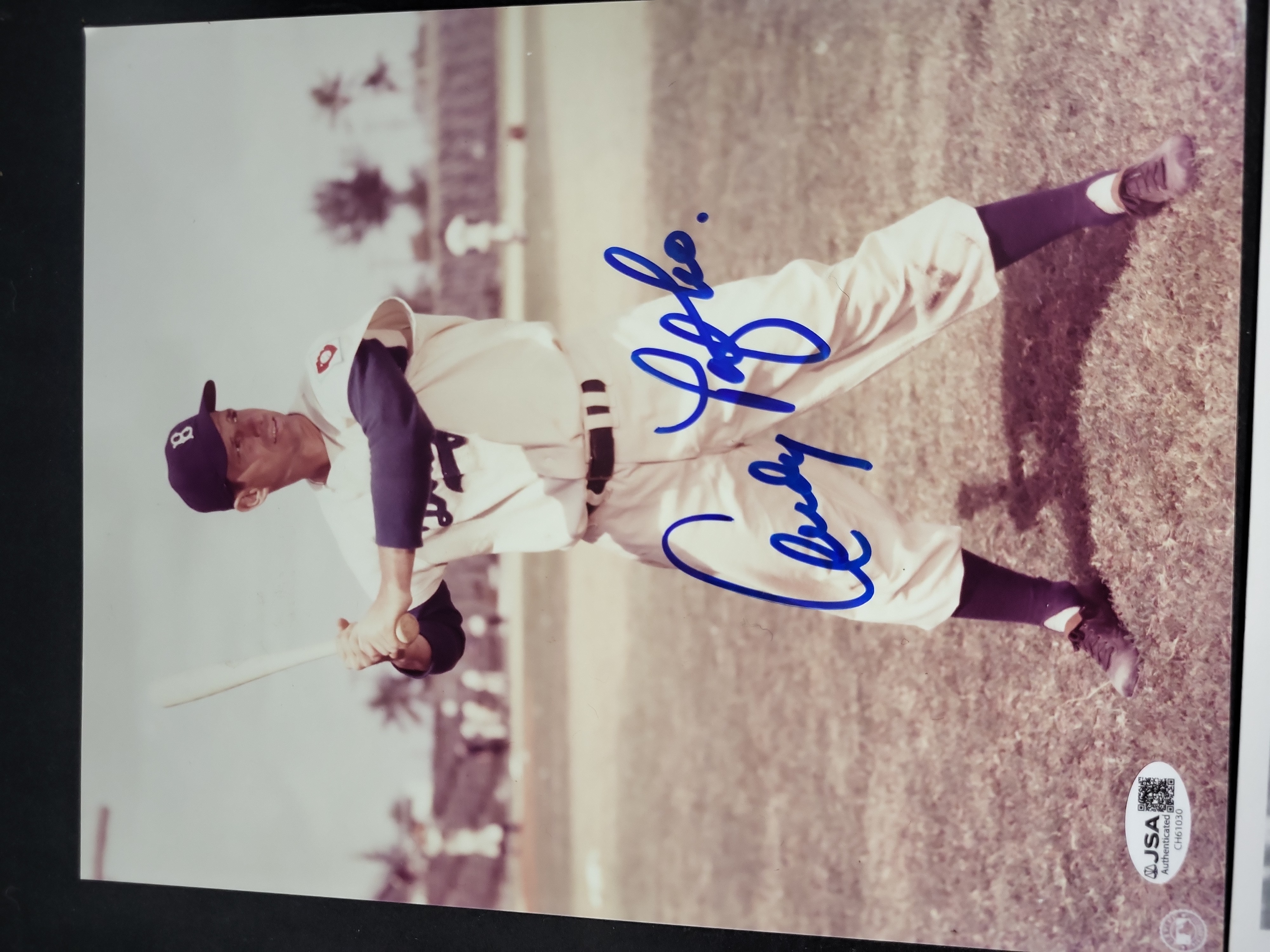 I03409 | A Collection of Four Autographed Baseball Photographs and Memorabilia Items Including Phil Rizzuto