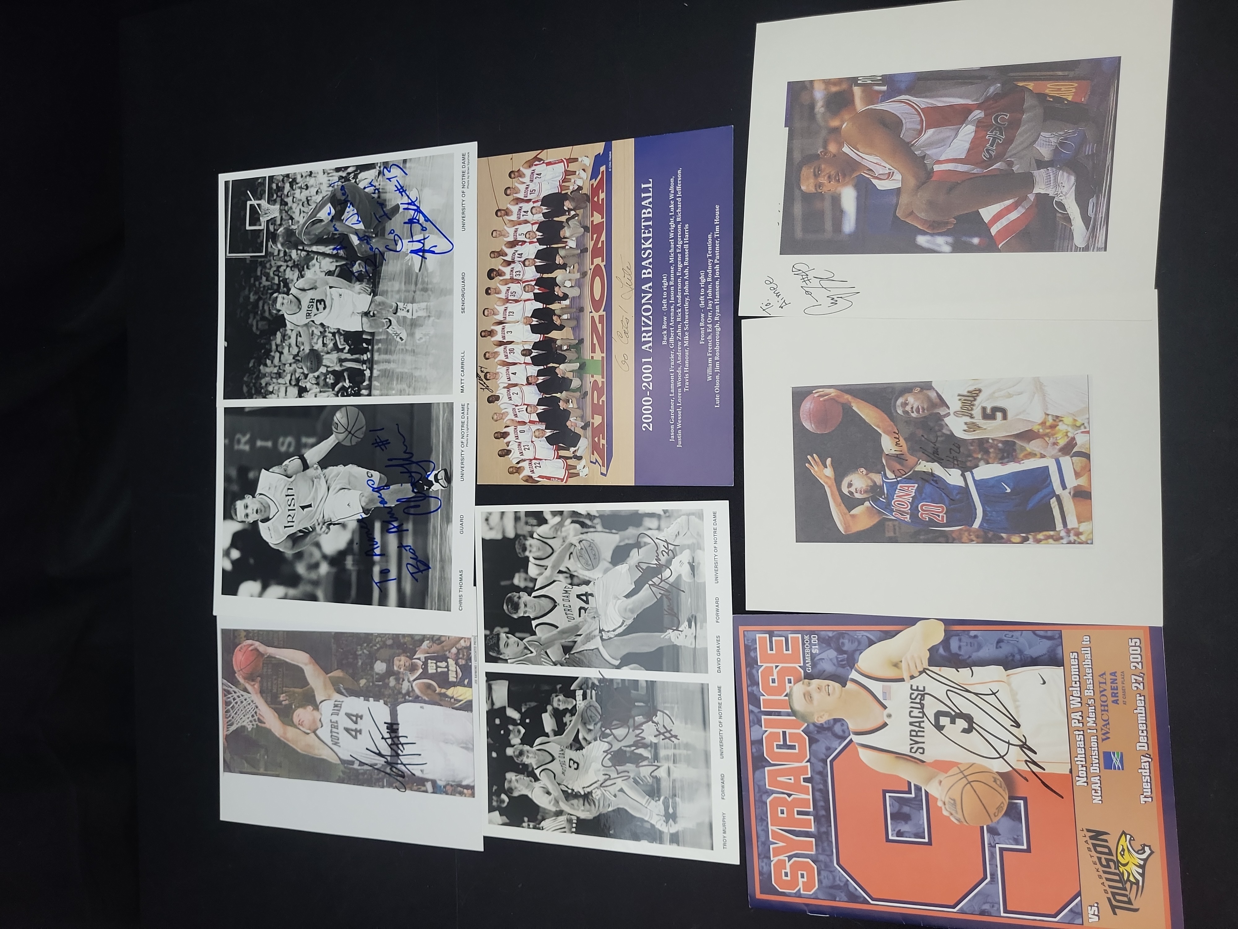 I03009 | A Collection of Autographed NCAA Basketball Photographs and Memorabilia Including Notre Dame Arizona and Syracuse
