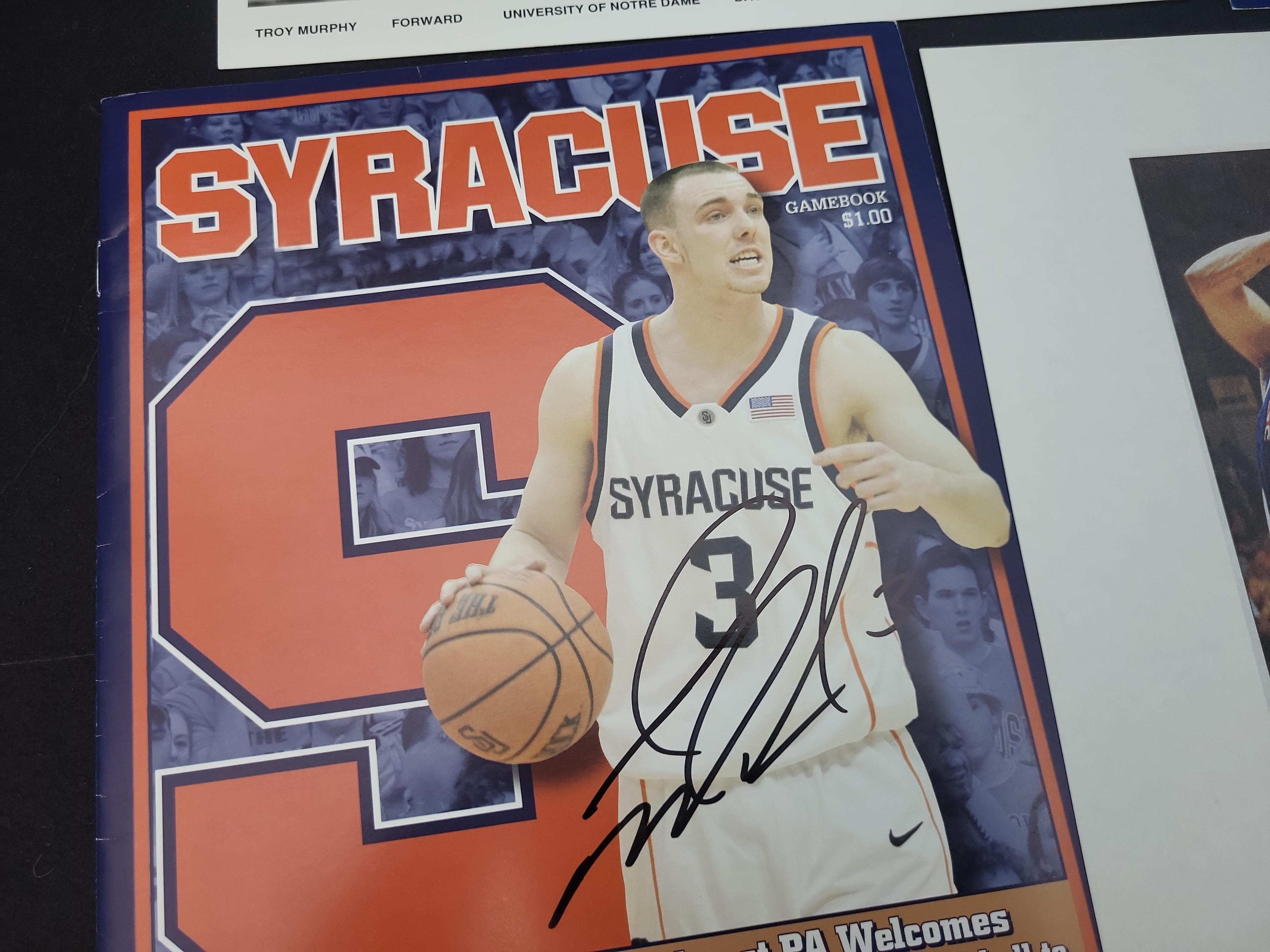 I03009 | A Collection of Autographed NCAA Basketball Photographs and Memorabilia Including Notre Dame Arizona and Syracuse