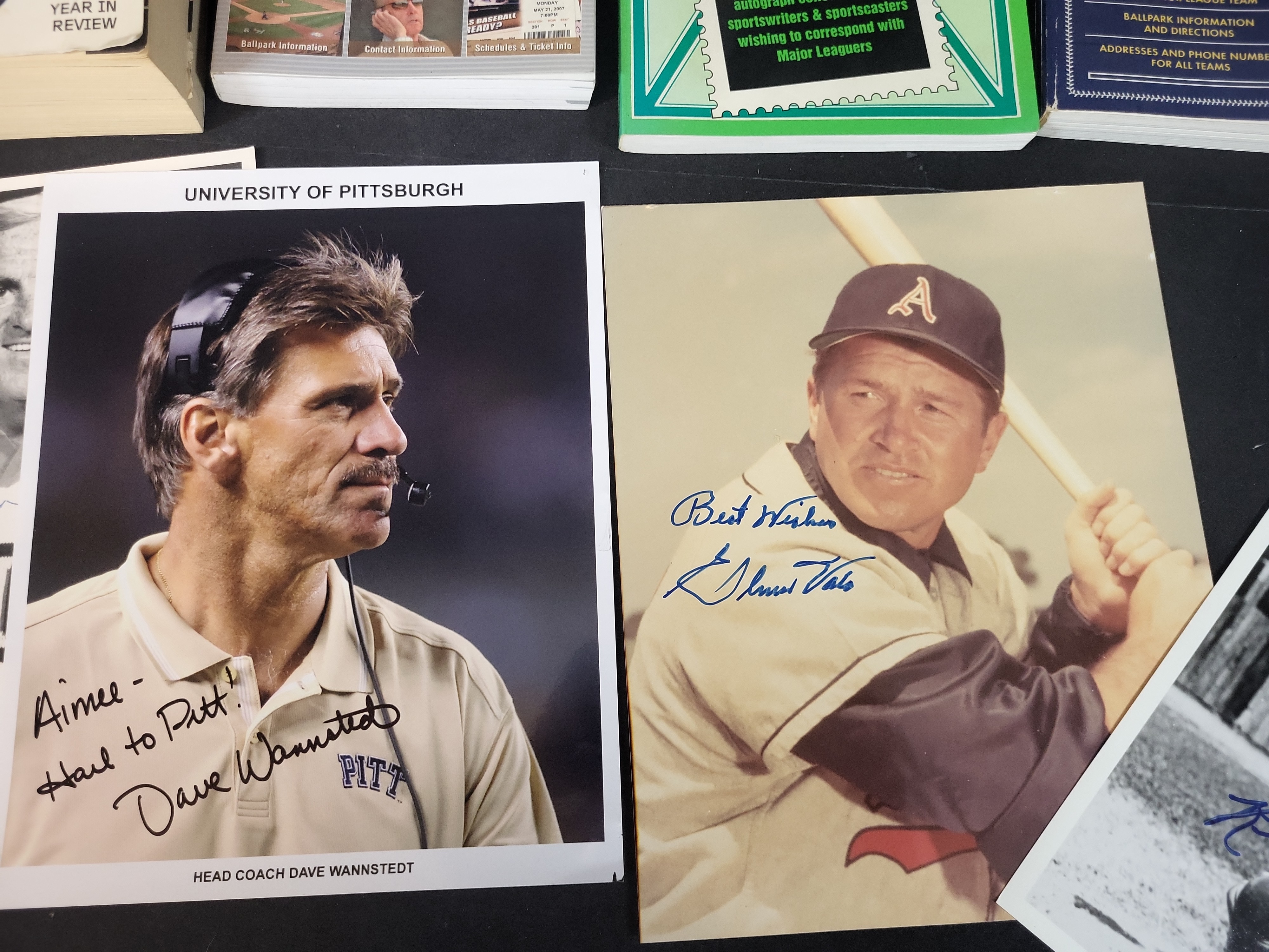 I03047 | A Collection of Sports Memorabilia Including Autographed Photographs, Vintage Pennants, and Reference Publications