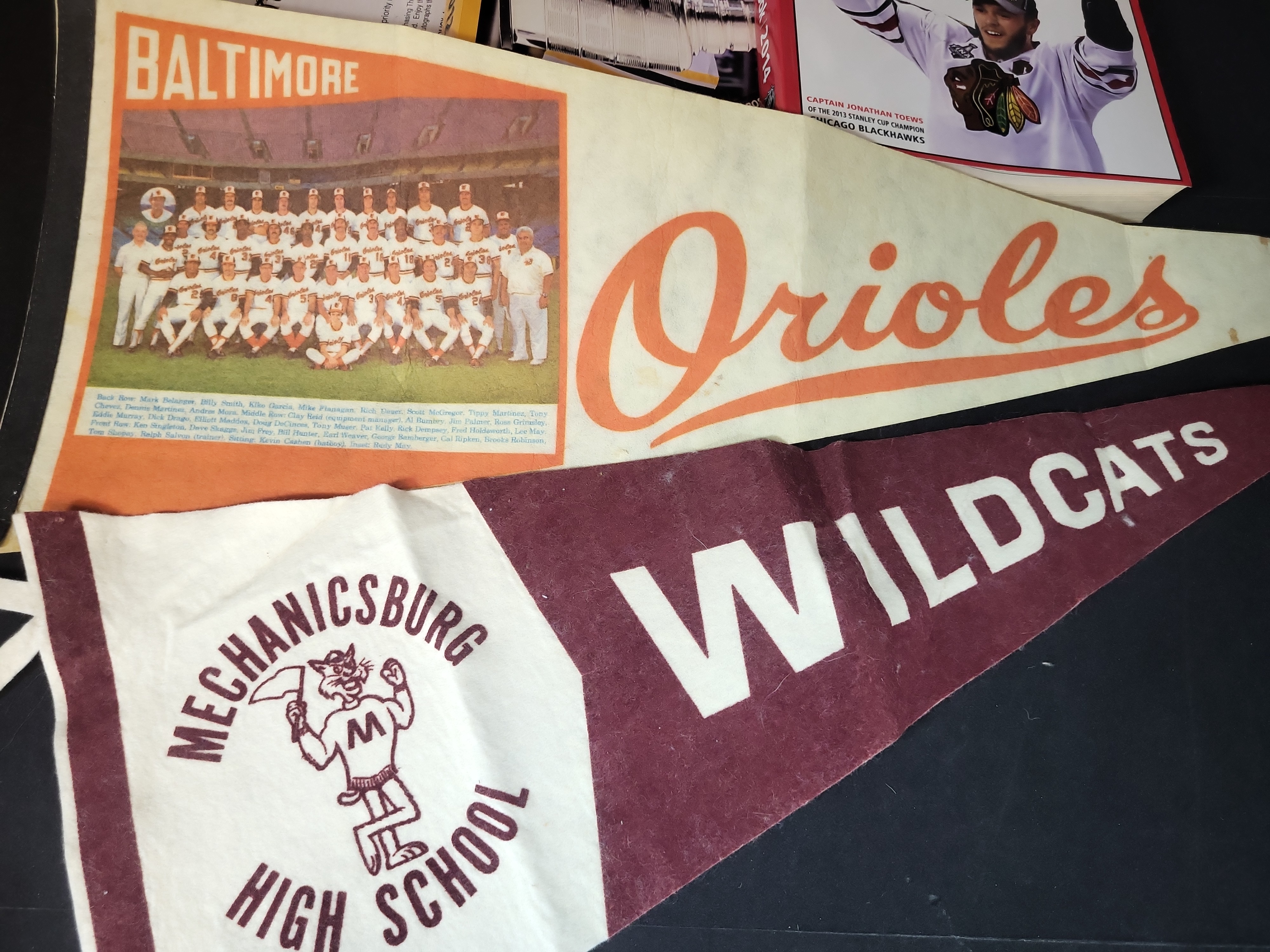 I03047 | A Collection of Sports Memorabilia Including Autographed Photographs, Vintage Pennants, and Reference Publications