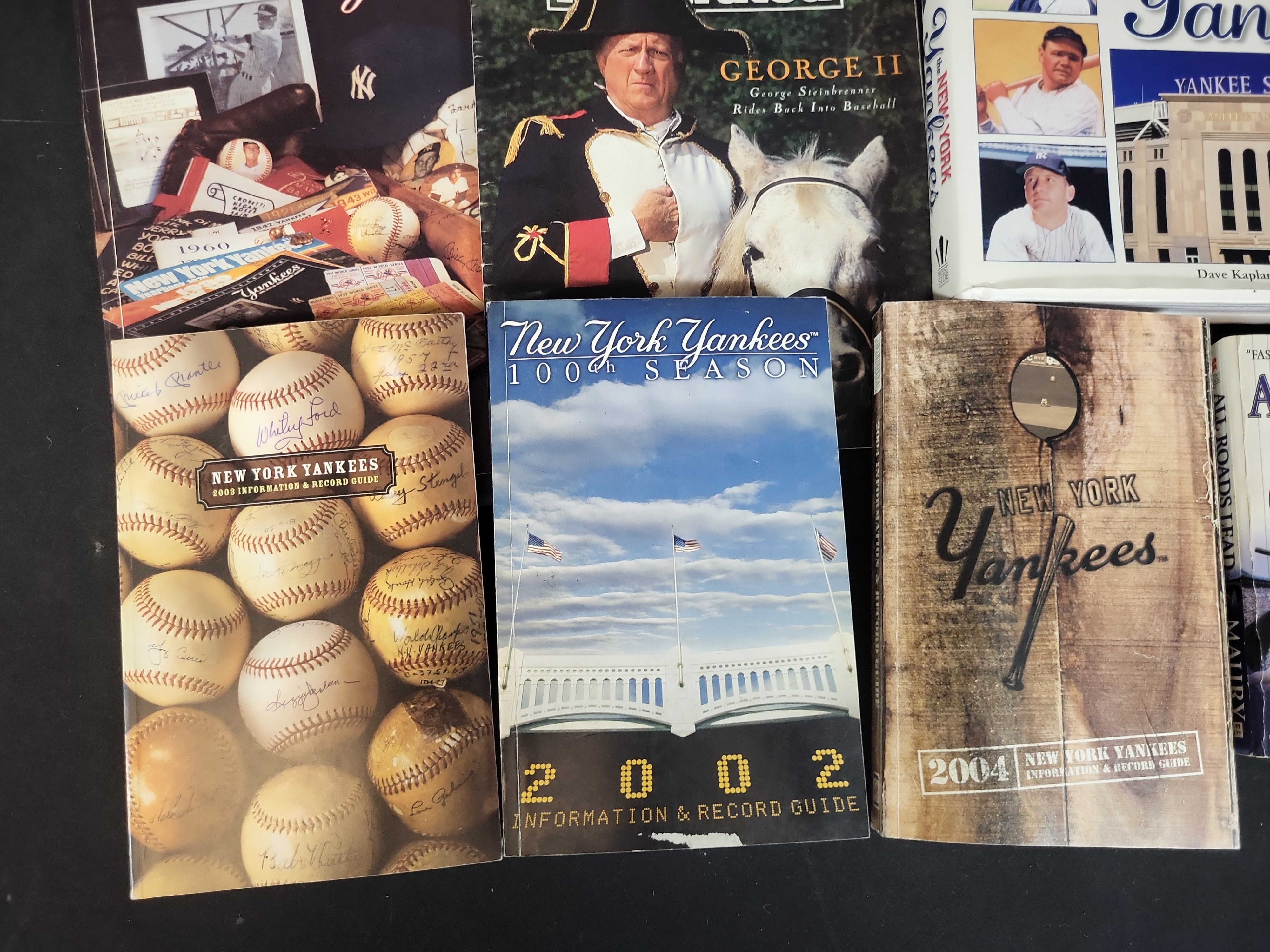 I03048 | Collection of New York Yankees Baseball Memorabilia Including Framed Photos, Magazines, and Books