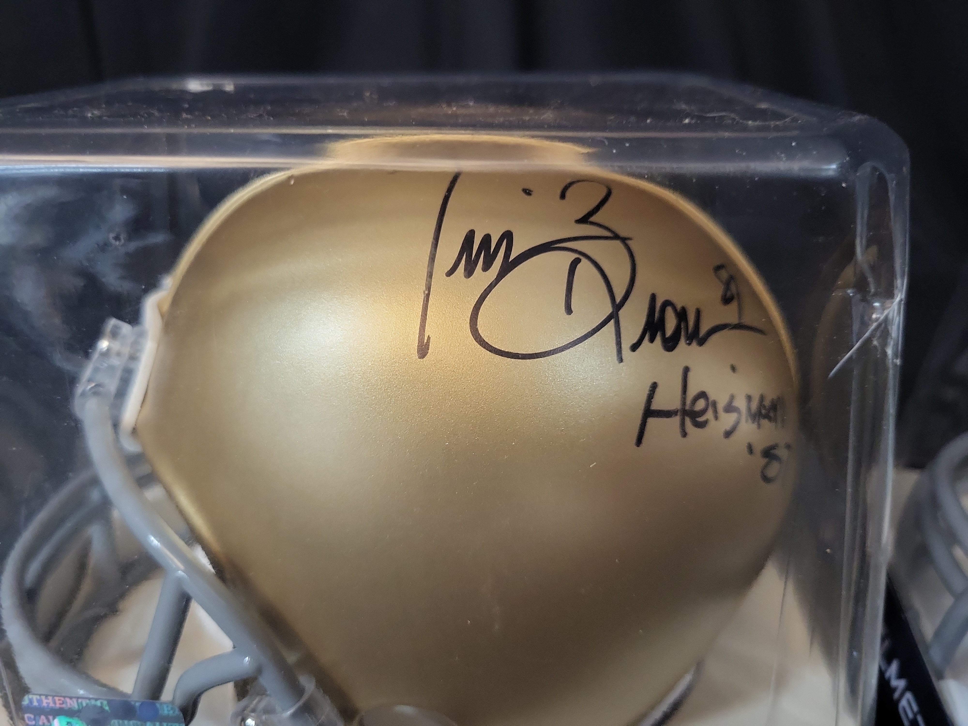 I03052 | A Pair of Riddell Mini Football Helmets Including a Signed Tim Brown Notre Dame Example and an Oakland Raiders Example