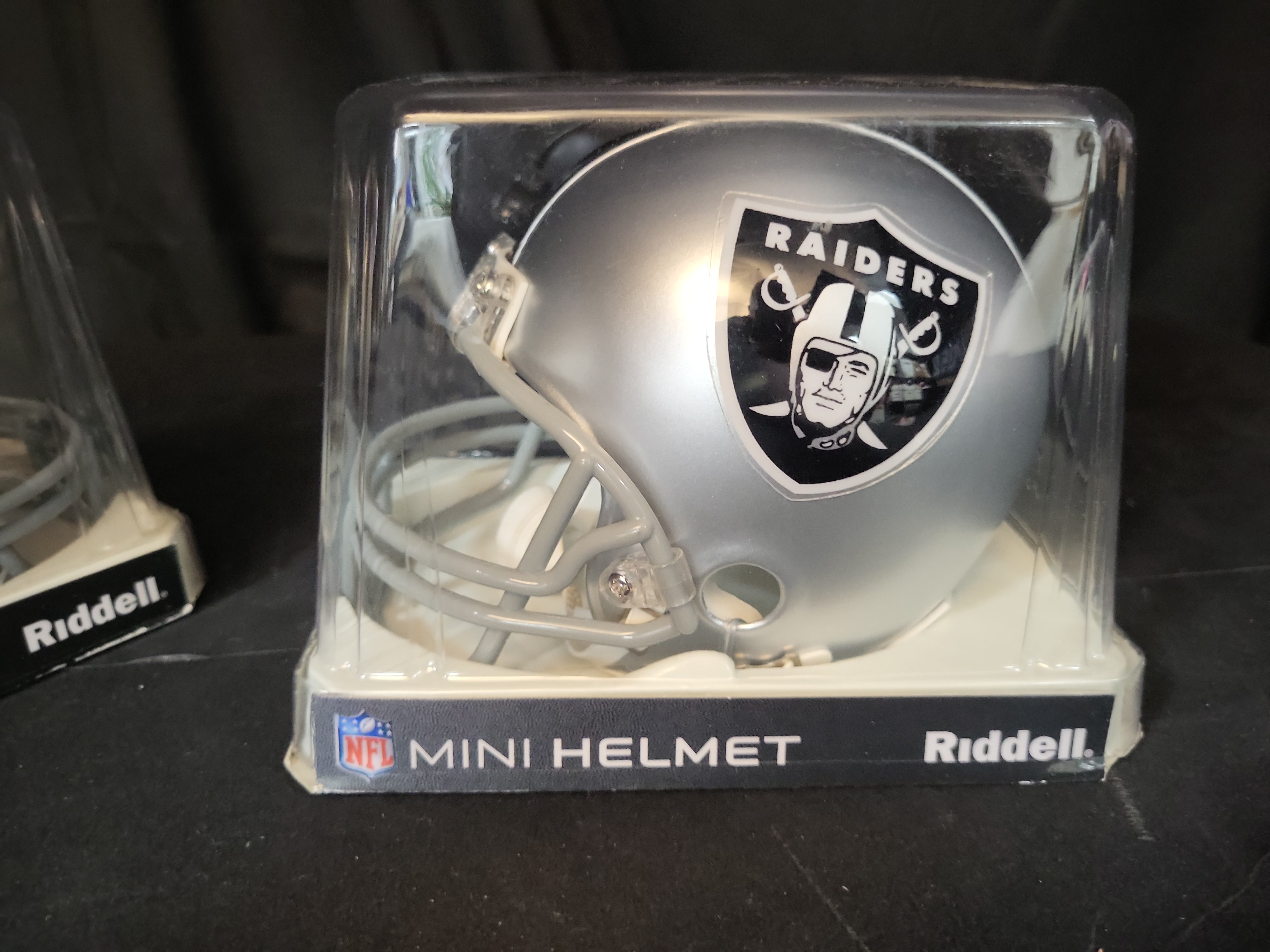 I03052 | A Pair of Riddell Mini Football Helmets Including a Signed Tim Brown Notre Dame Example and an Oakland Raiders Example