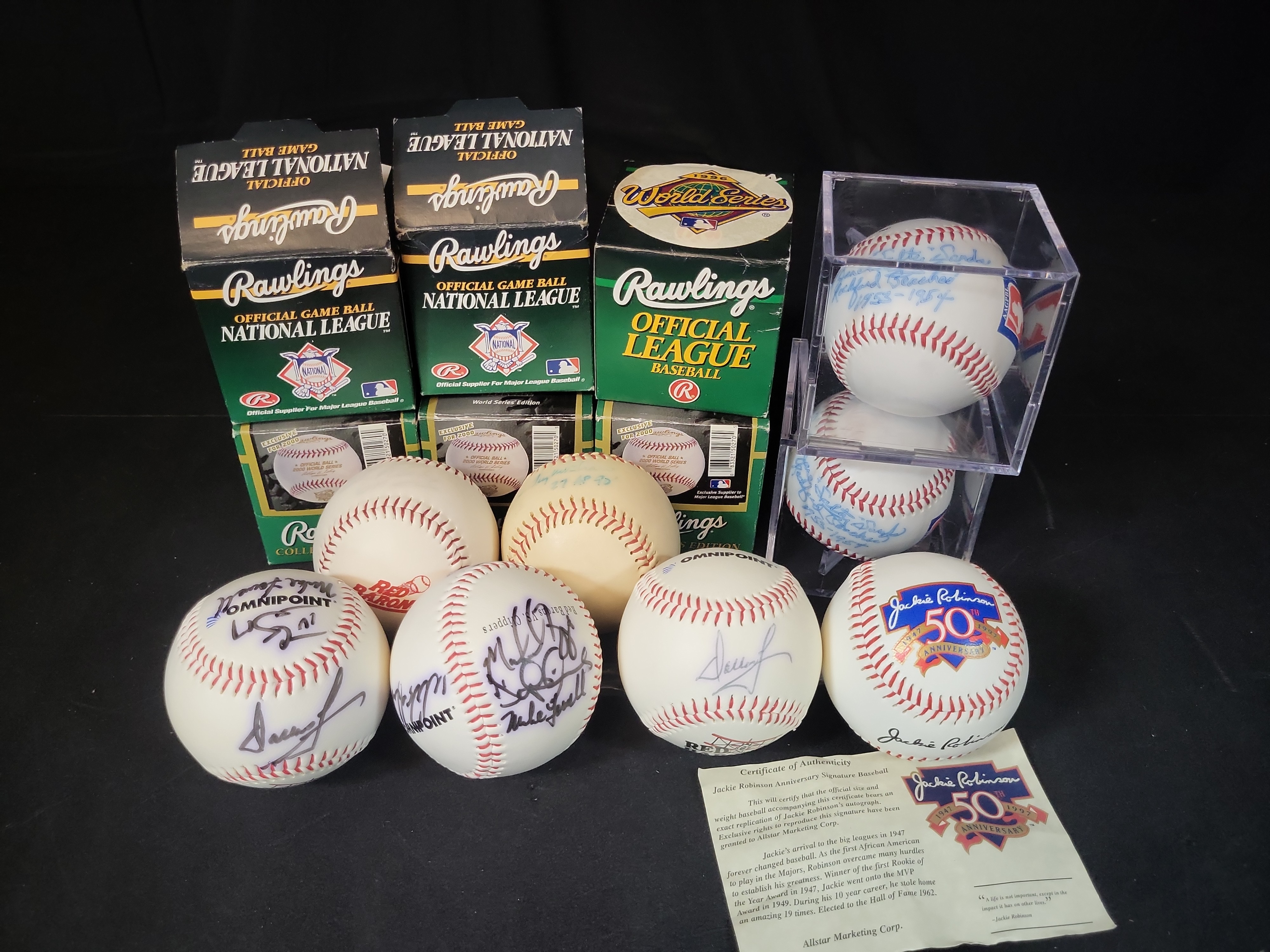 I03070 | Collection of Twelve Baseball Memorabilia Items Including Signed Balls and Official Packaging