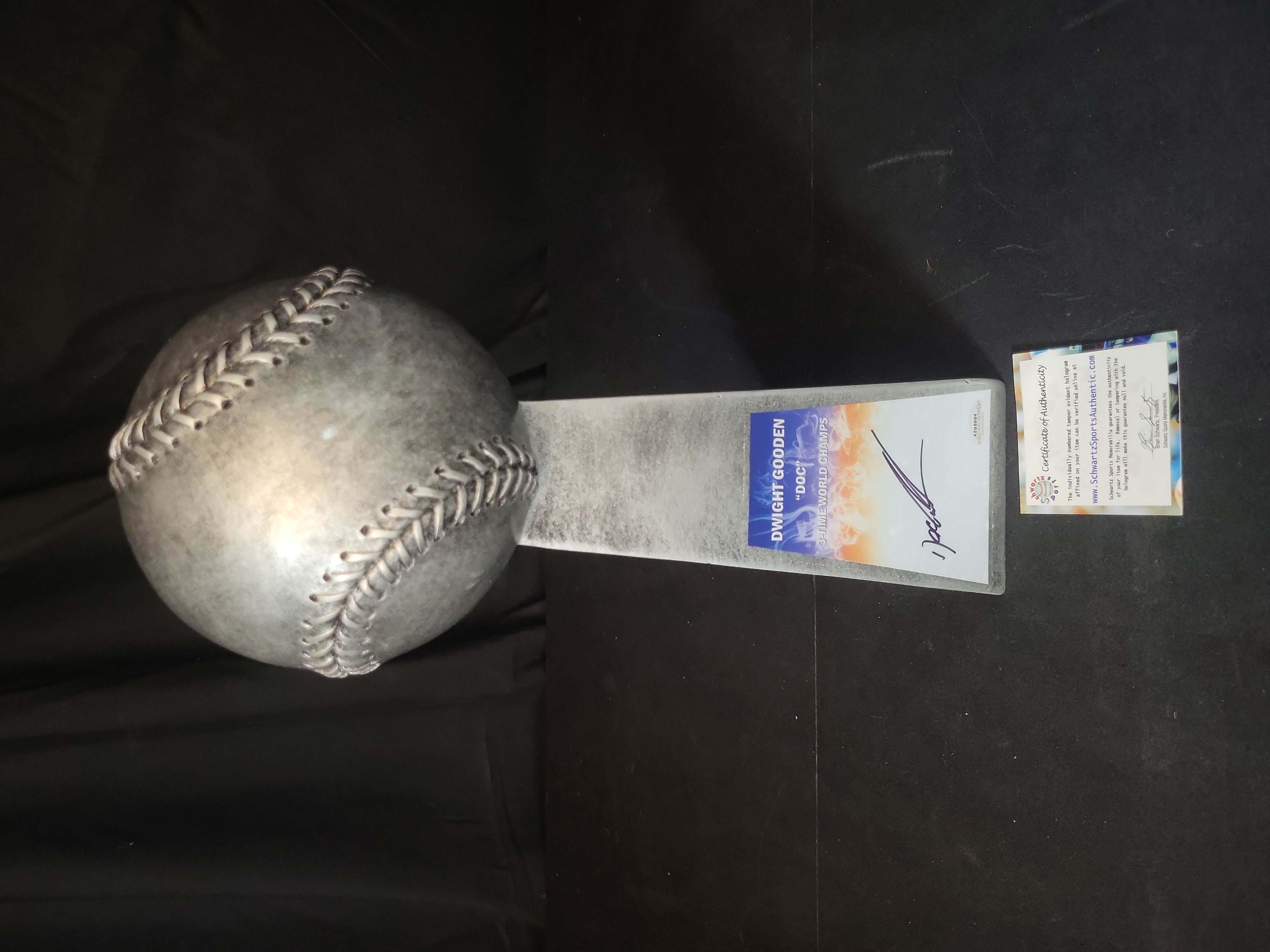 I03119 | Dwight Doc Gooden Signed 14-Inch Replica Silver World Champion Baseball Trophy